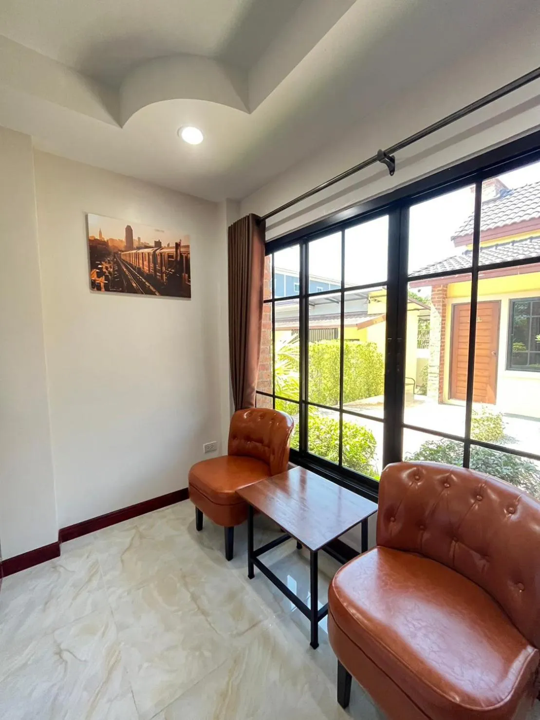 Seating area in CottagePine Rayong Resort&Cafe