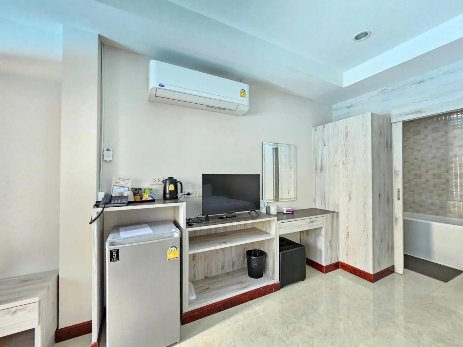 TV and multimedia in CottagePine Rayong Resort&Cafe