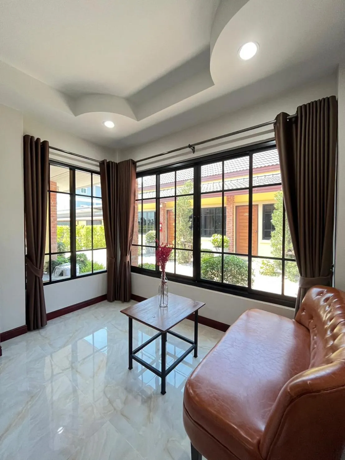 Seating area in CottagePine Rayong Resort&Cafe