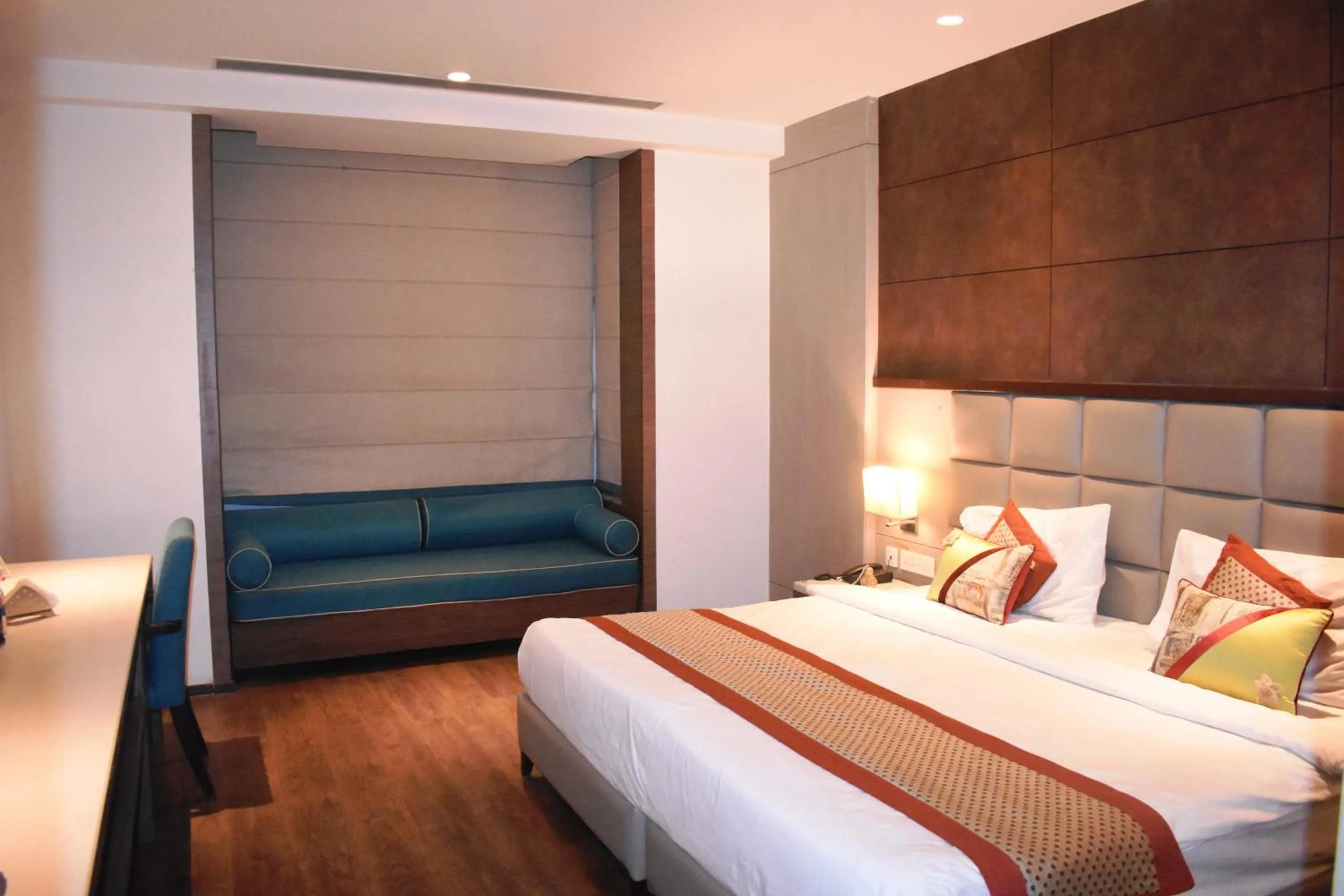 Photo of the whole room, Bed in Lemonwood Suites by F9 Hotels - Trivoli Garden Chhatarpur