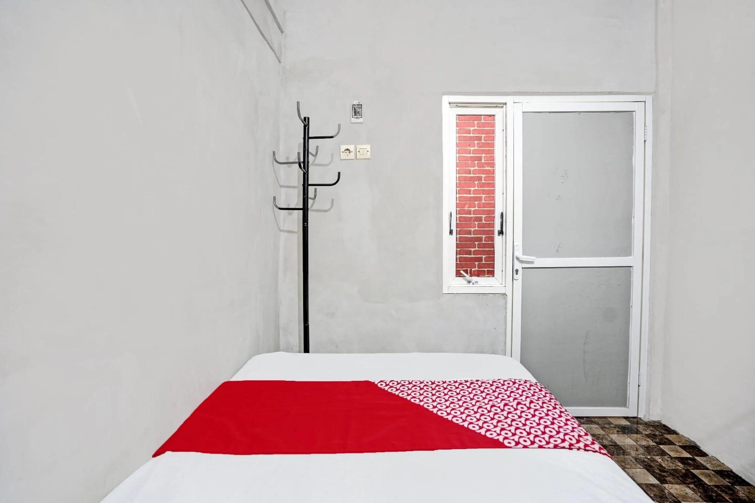 Bedroom in OYO Life 92310 Banyu Homestay