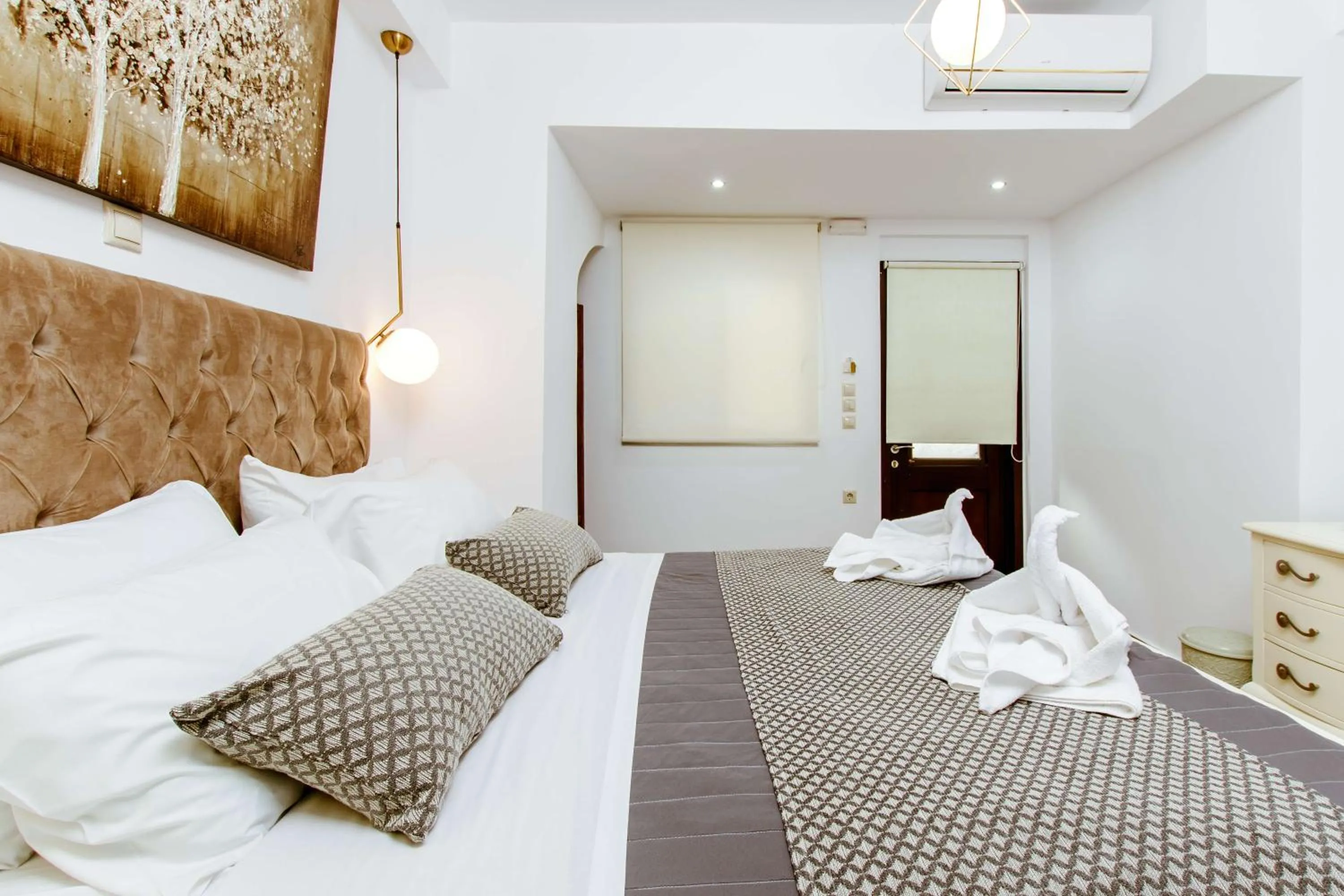 Bed in Bozzali Deluxe Hotel