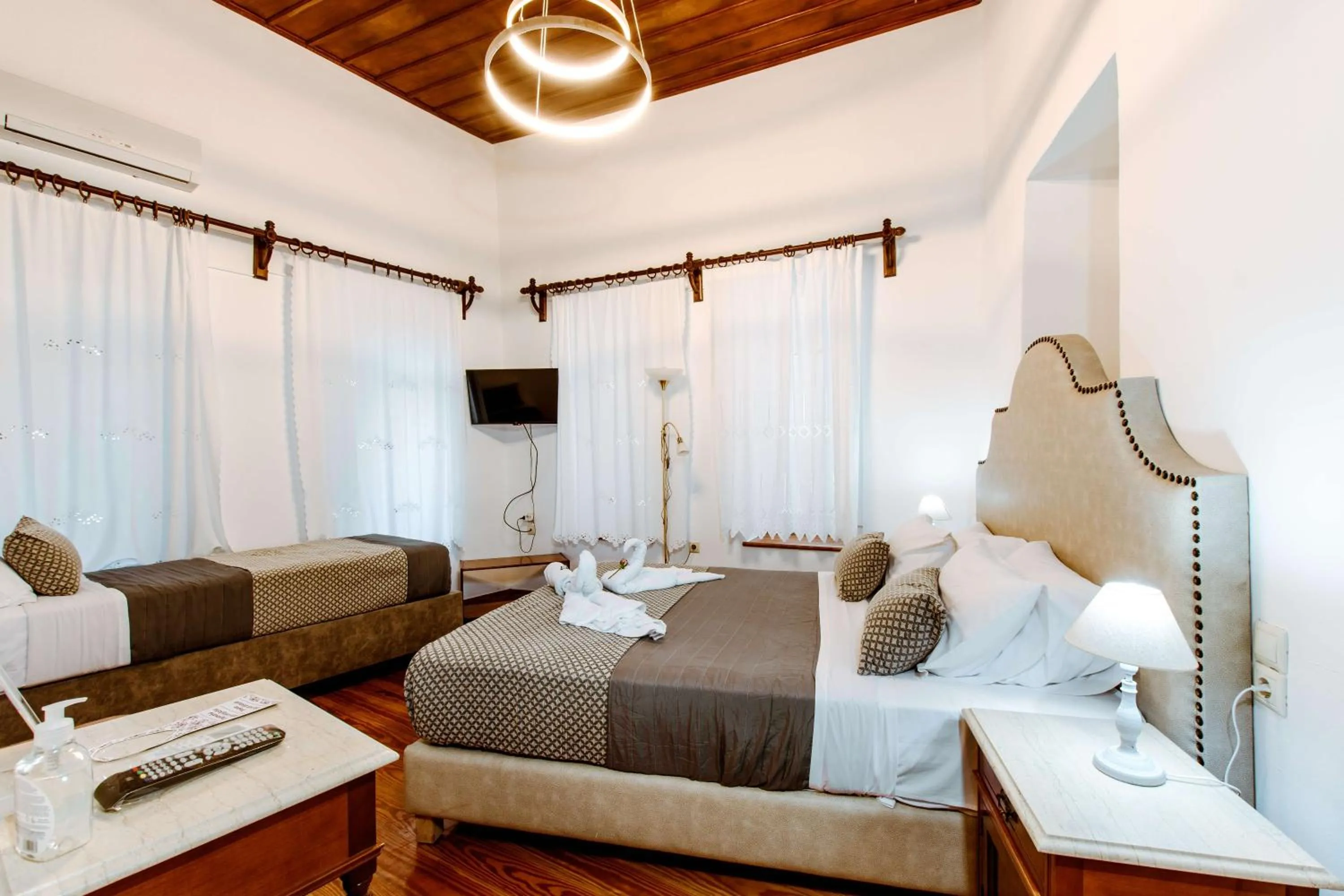 Bed in Bozzali Deluxe Hotel