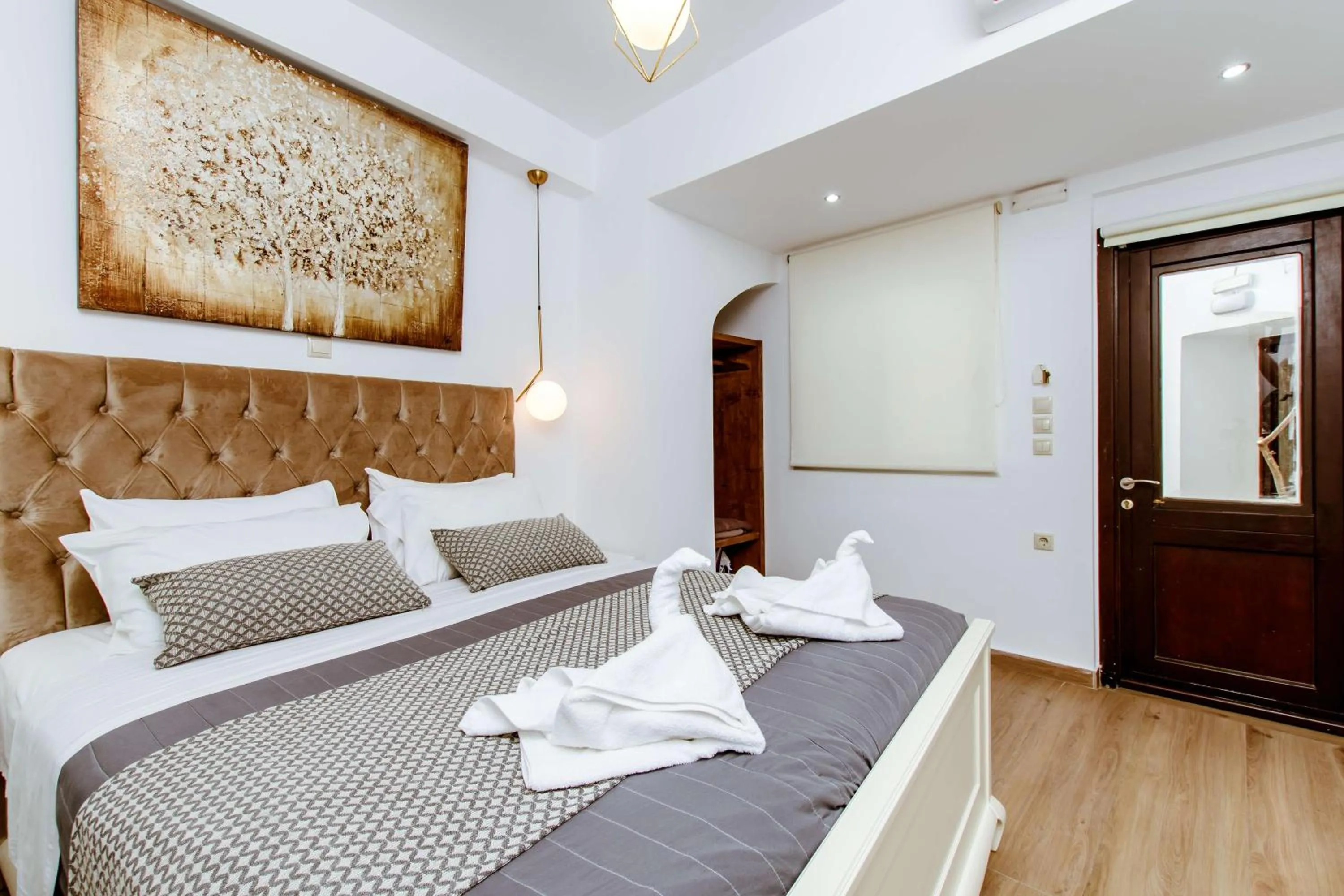 Bed in Bozzali Deluxe Hotel