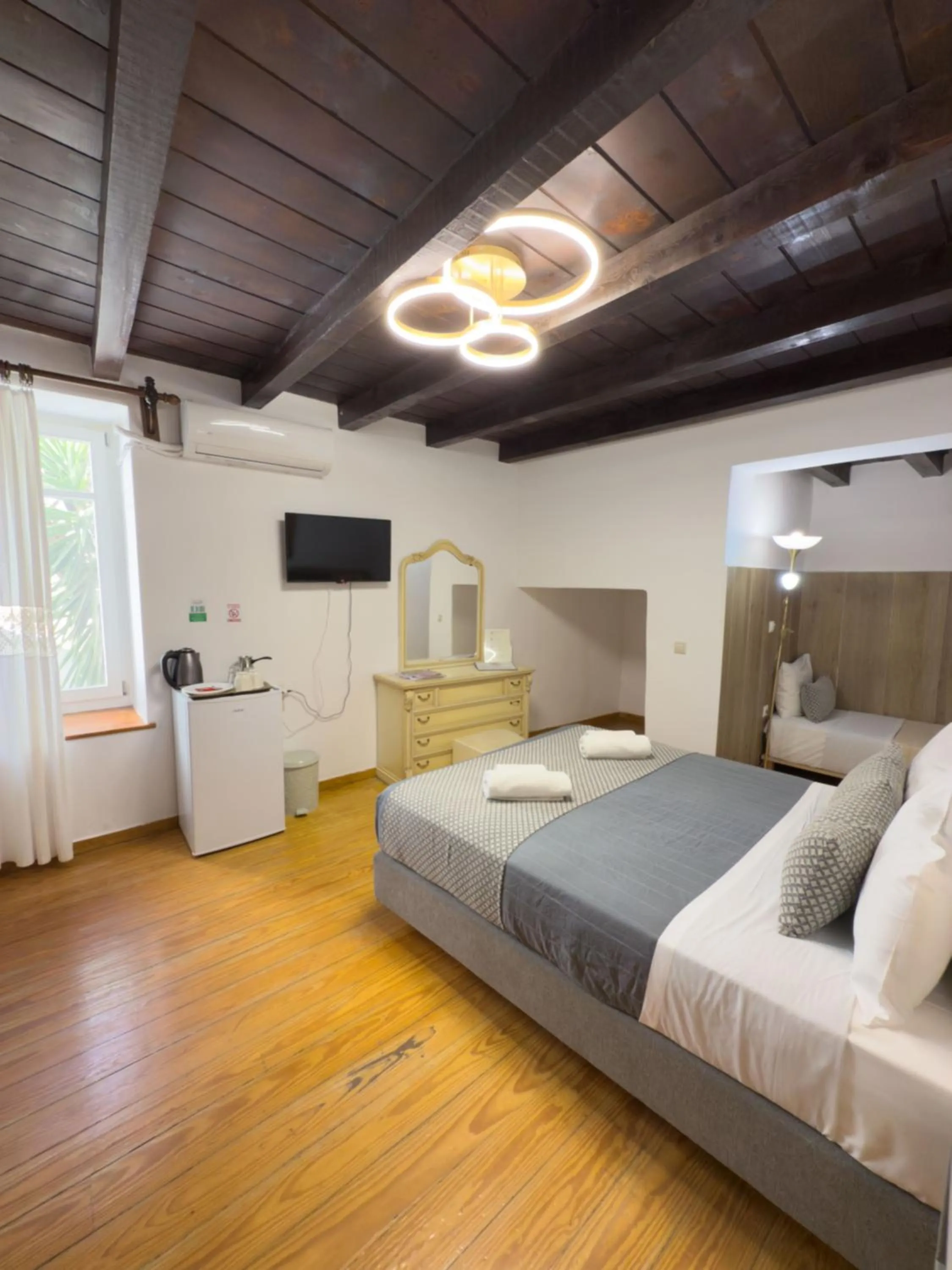 Photo of the whole room, Bed in Bozzali Deluxe Hotel