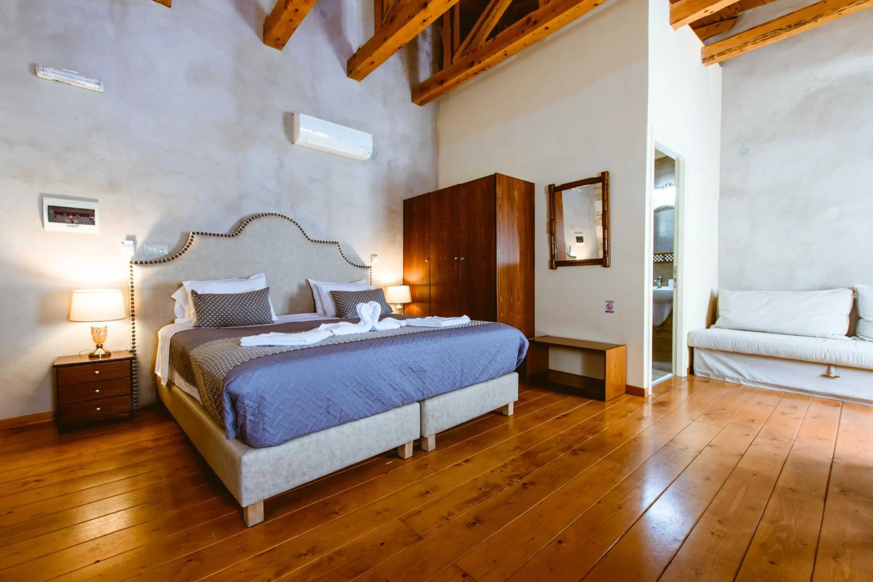 Bed in Bozzali Deluxe Hotel