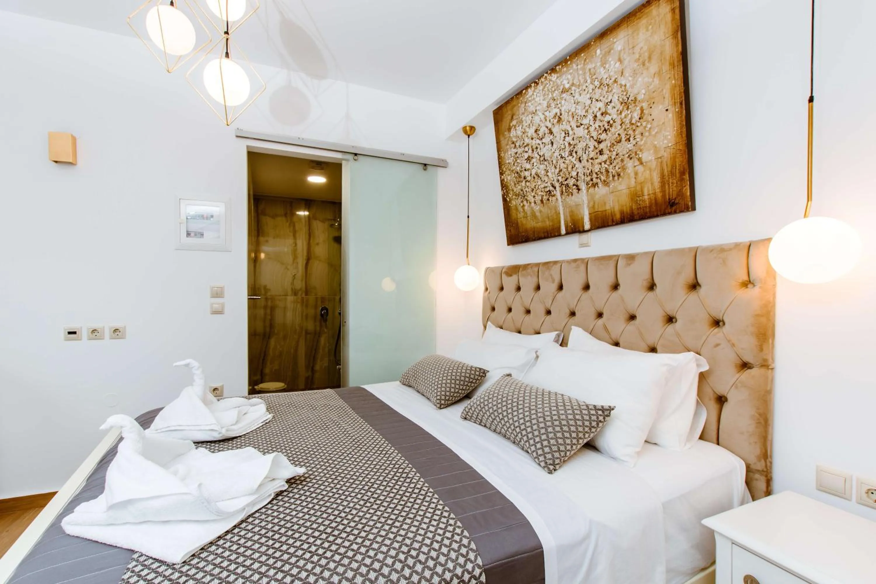 Bed in Bozzali Deluxe Hotel