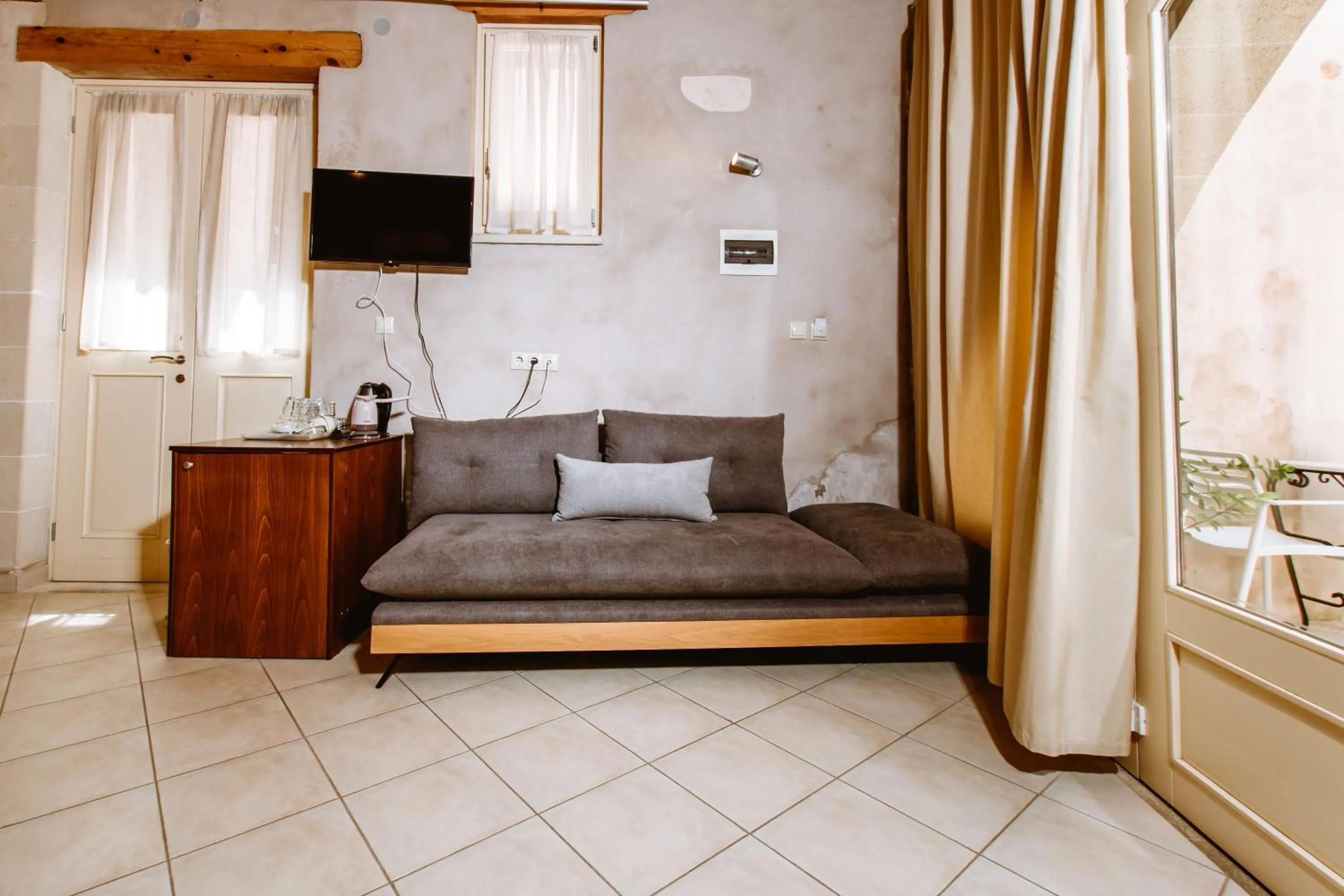 TV and multimedia in Bozzali Deluxe Hotel