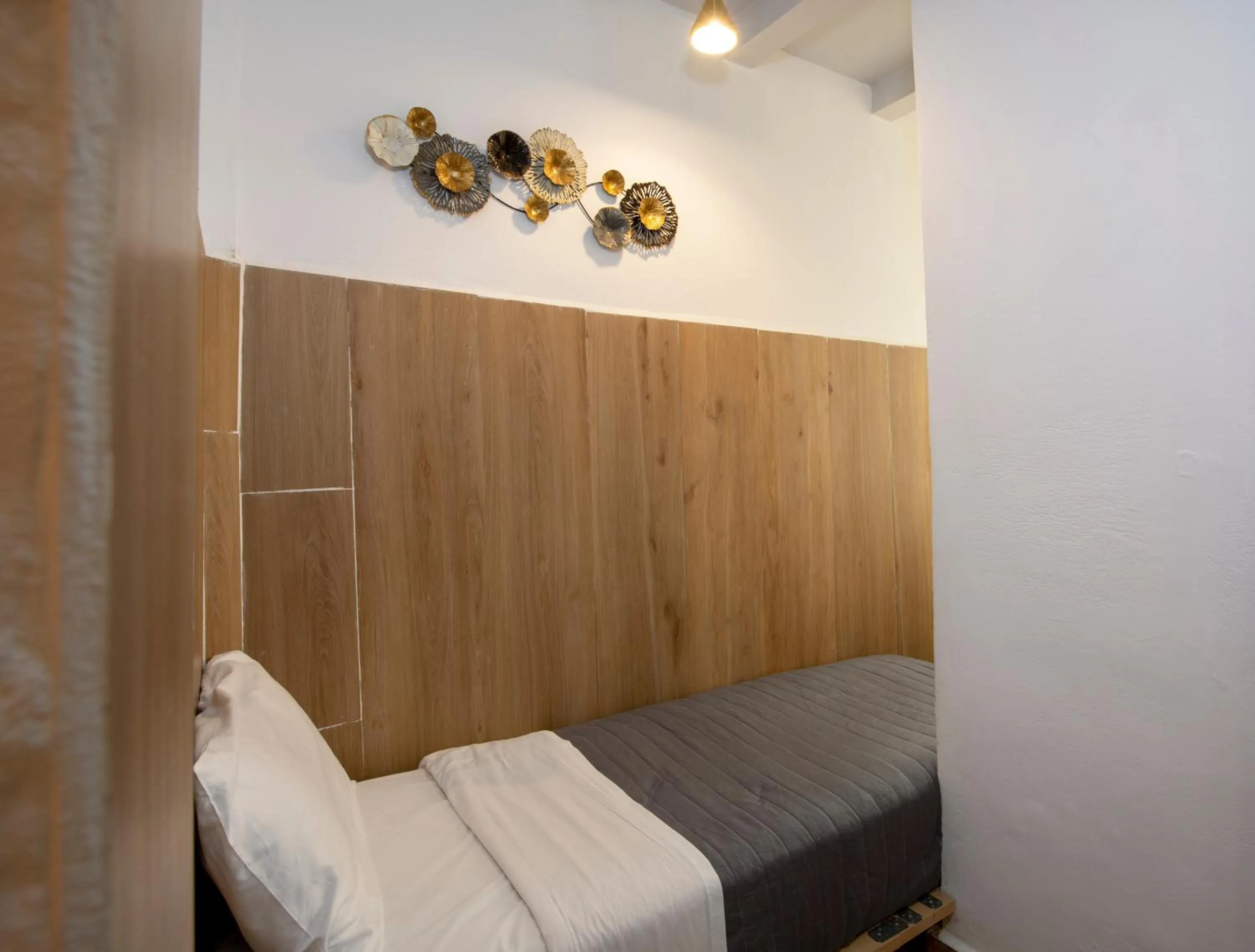 Bed in Bozzali Deluxe Hotel