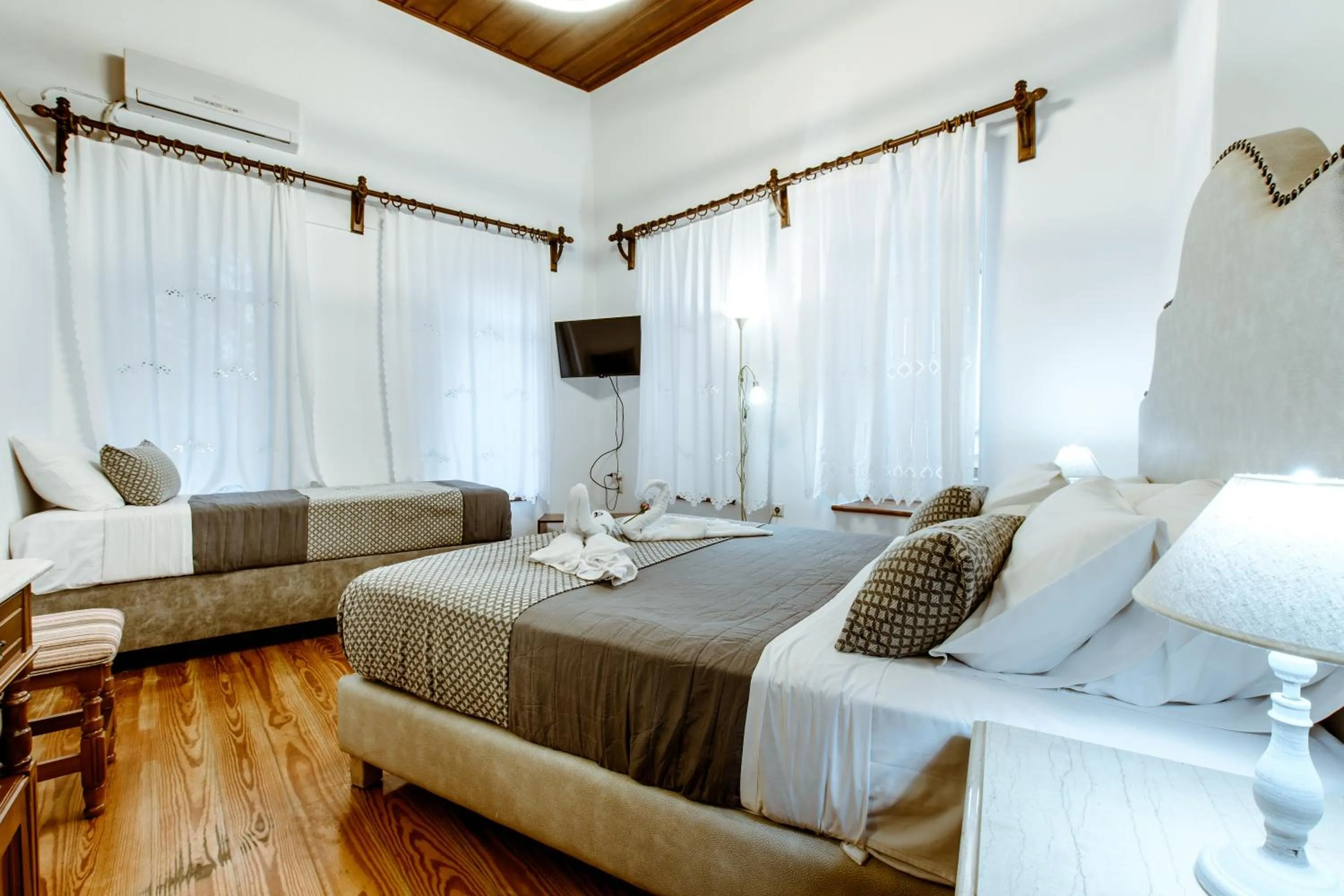 Bed in Bozzali Deluxe Hotel