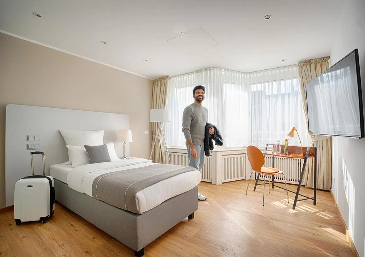 Photo of the whole room, Bed in Hotel Am Brinkerplatz