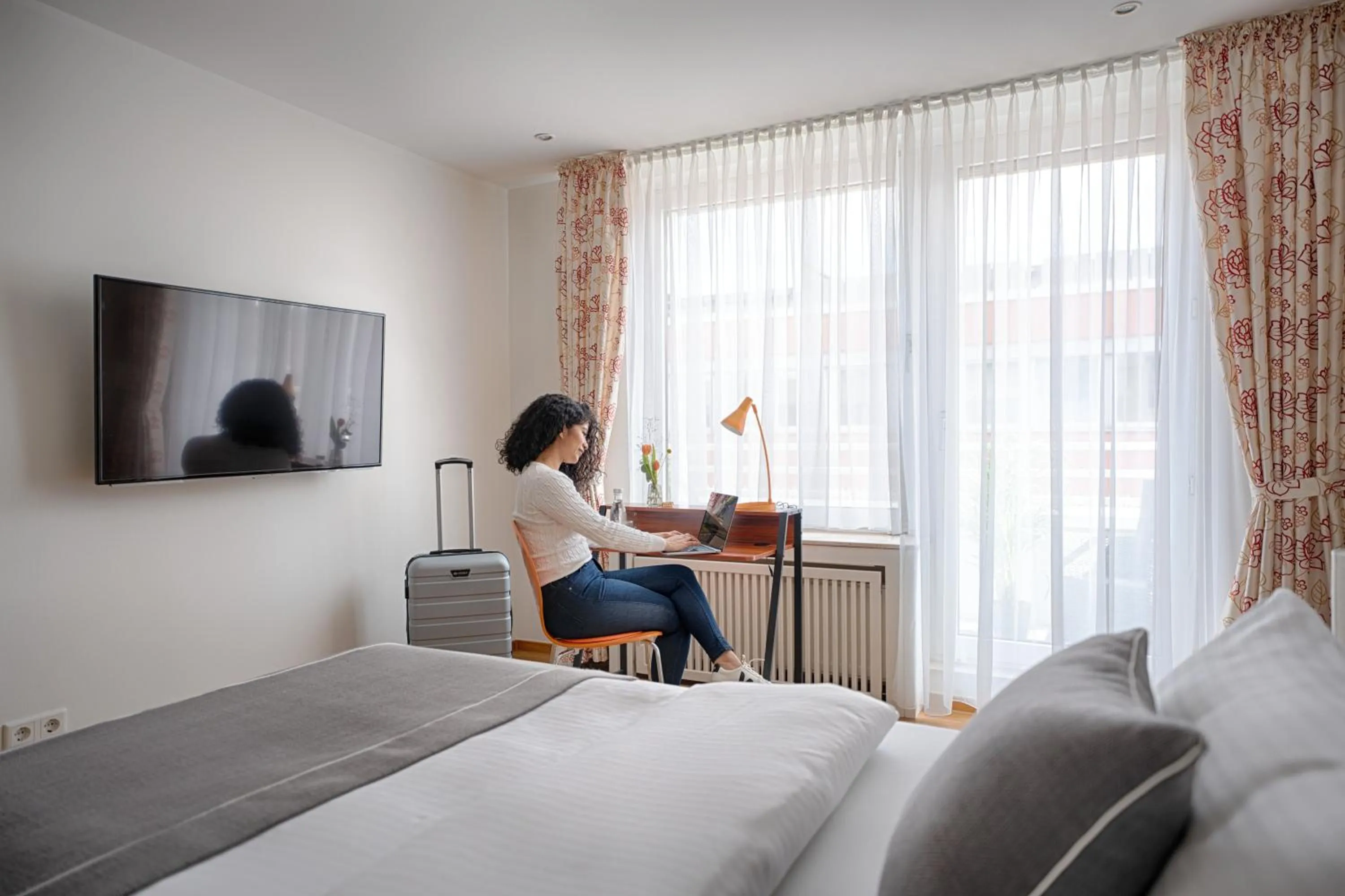 Seating area, Bed in Hotel Am Brinkerplatz