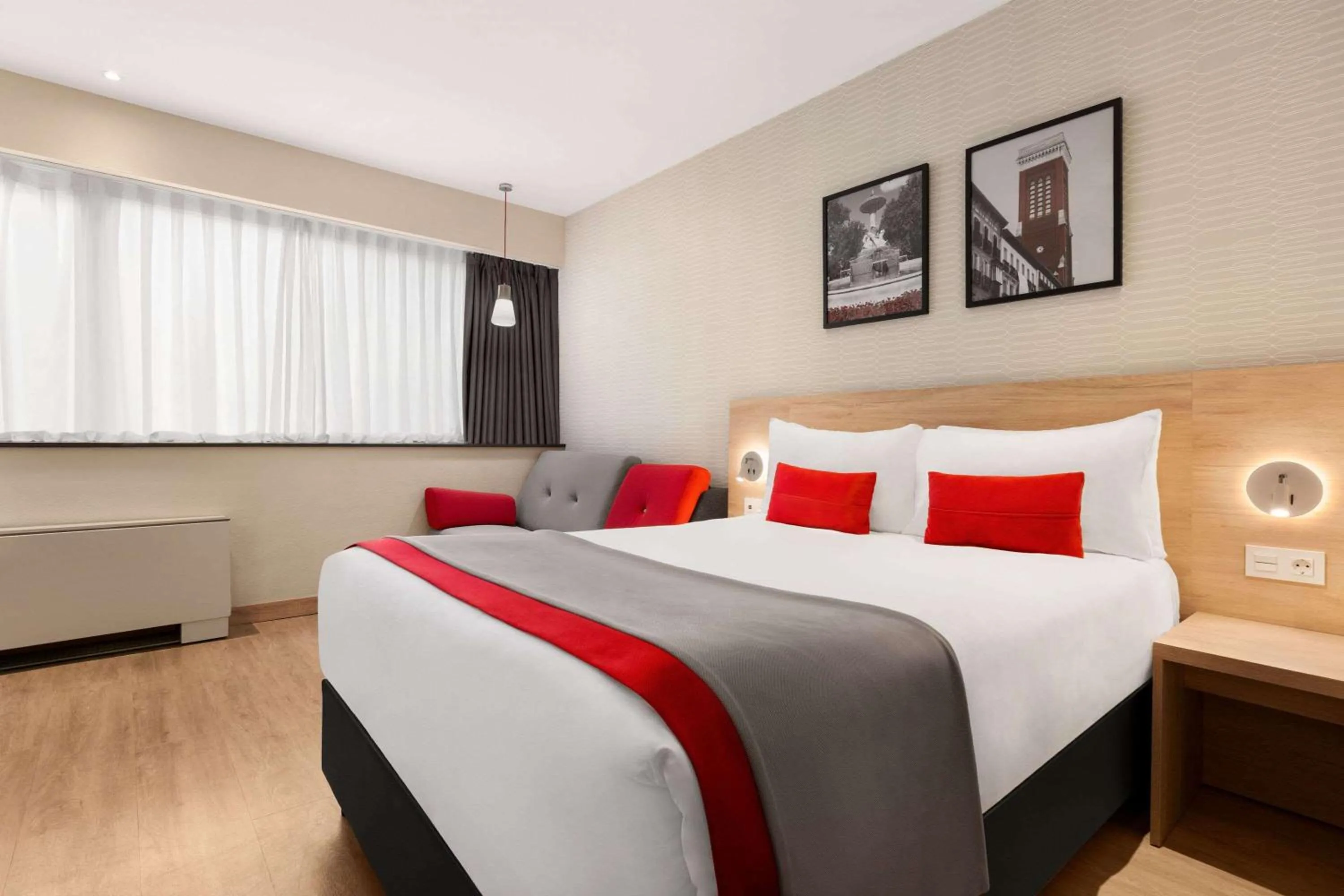 Photo of the whole room, Bed in Ramada by Wyndham Madrid Tres Cantos