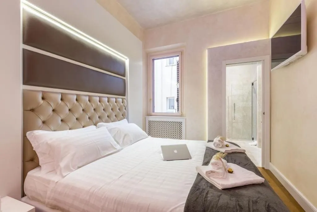 Bed in Piazza Venezia Luxury Suite