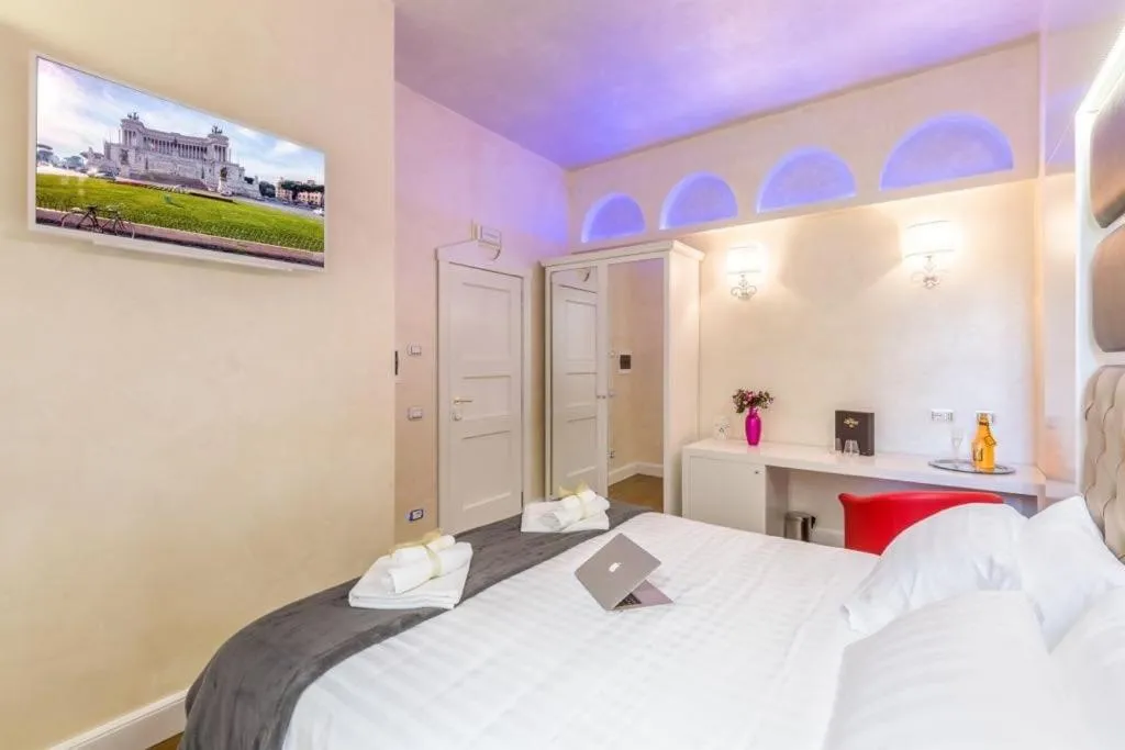 Bed in Piazza Venezia Luxury Suite