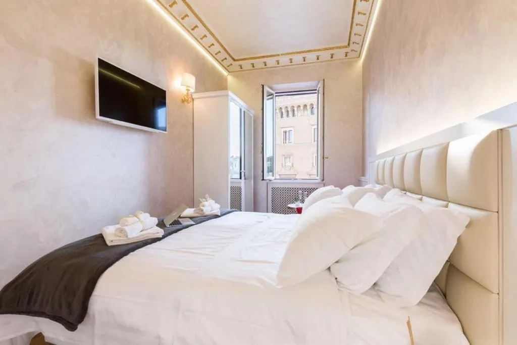 Bed in Piazza Venezia Luxury Suite
