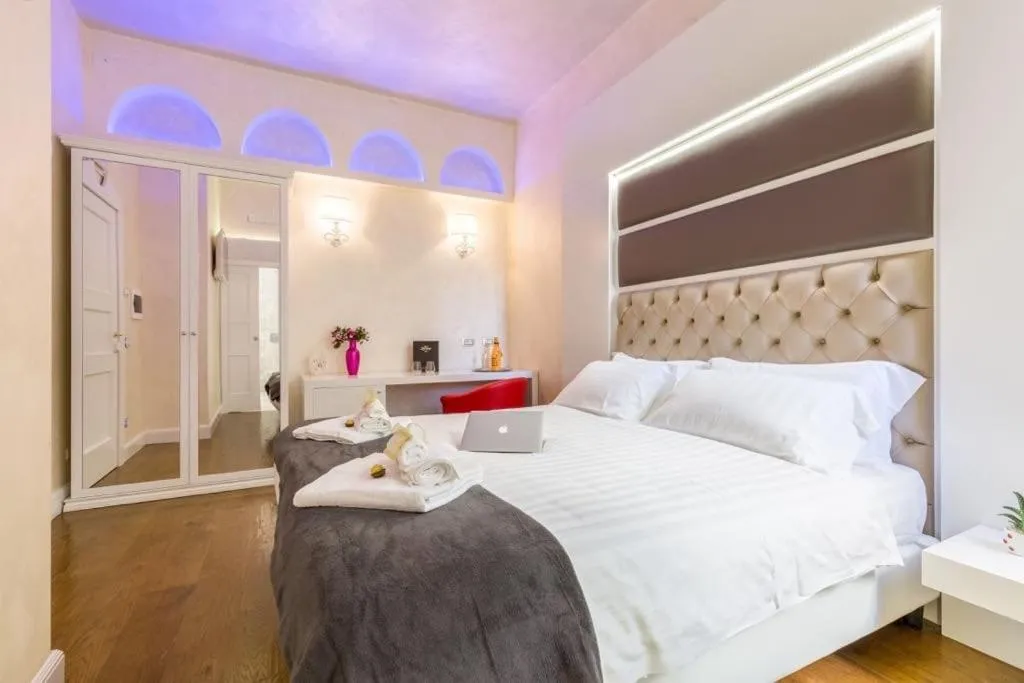Bed in Piazza Venezia Luxury Suite