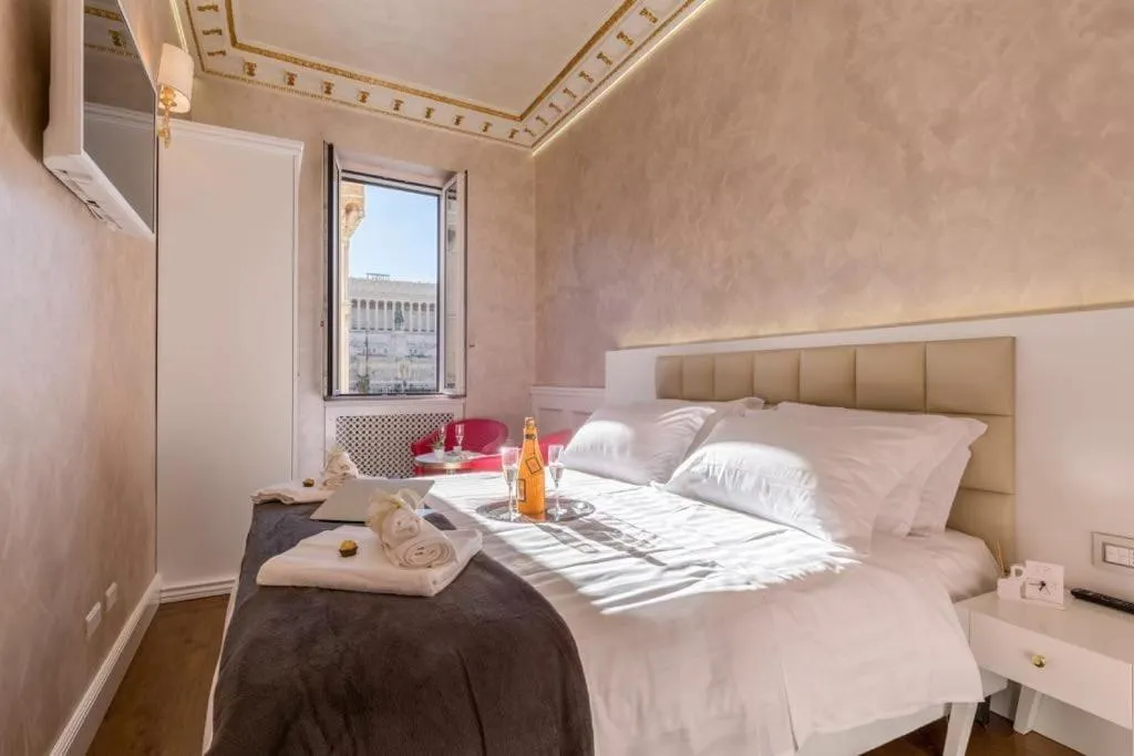 Bed in Piazza Venezia Luxury Suite