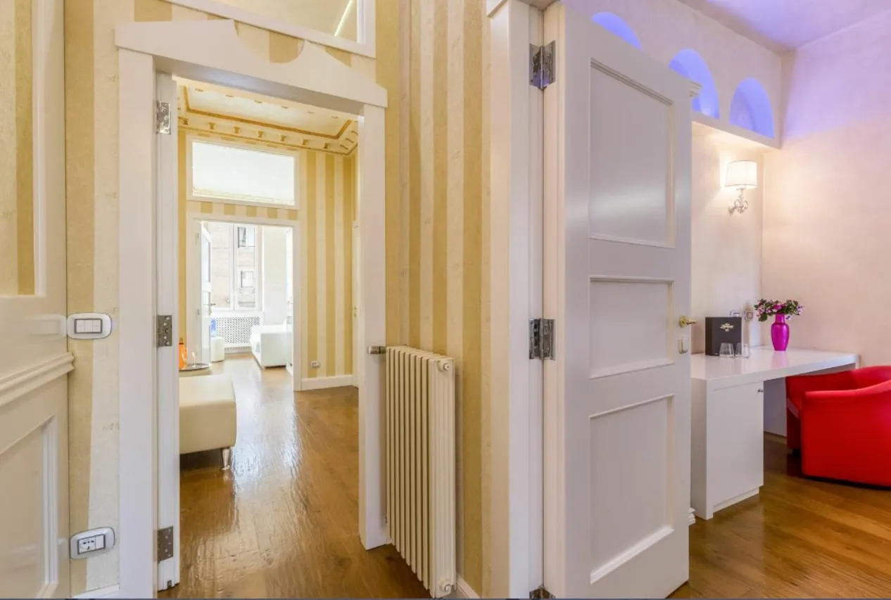 Living room, Bed in Piazza Venezia Luxury Suite