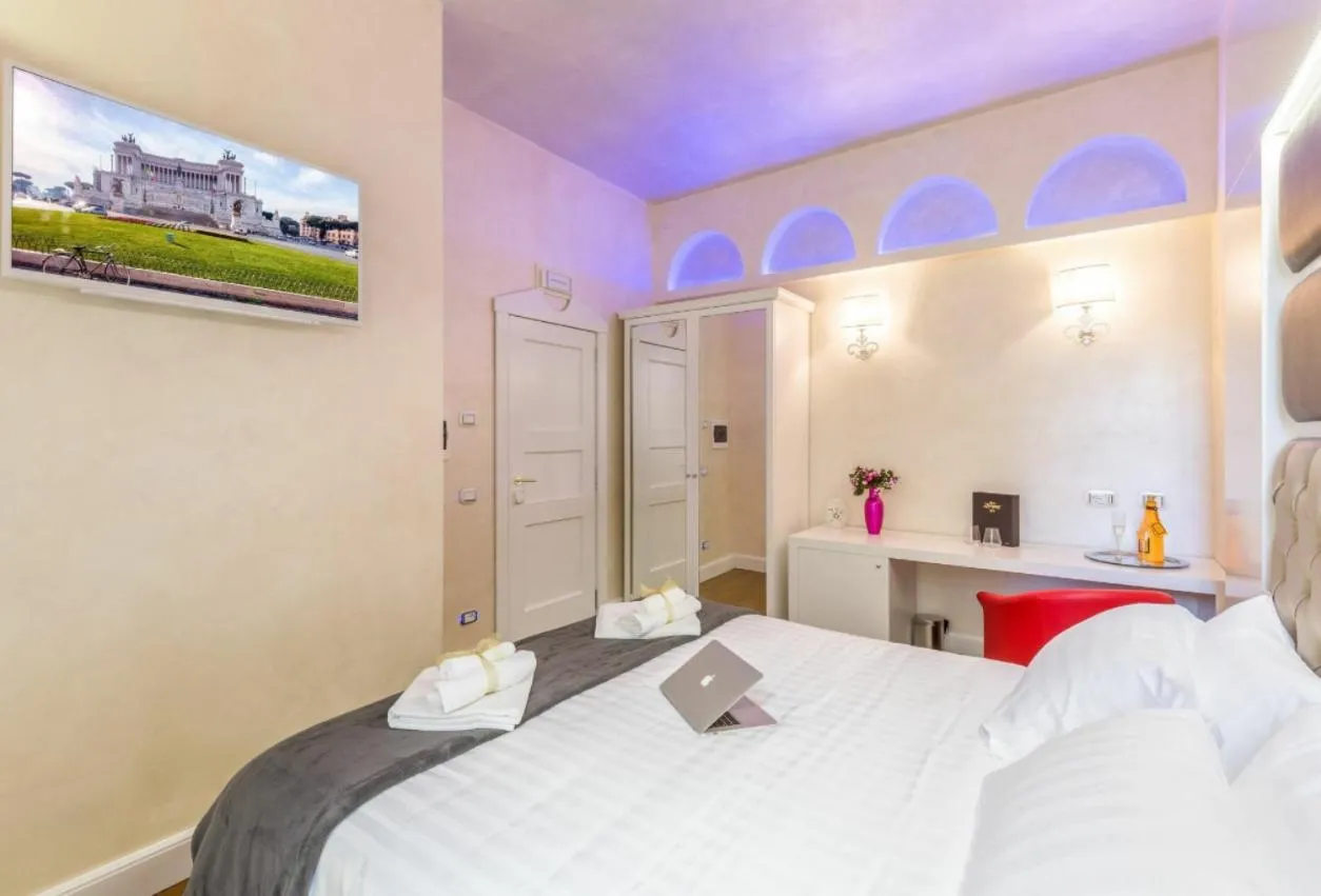 Bed in Piazza Venezia Luxury Suite