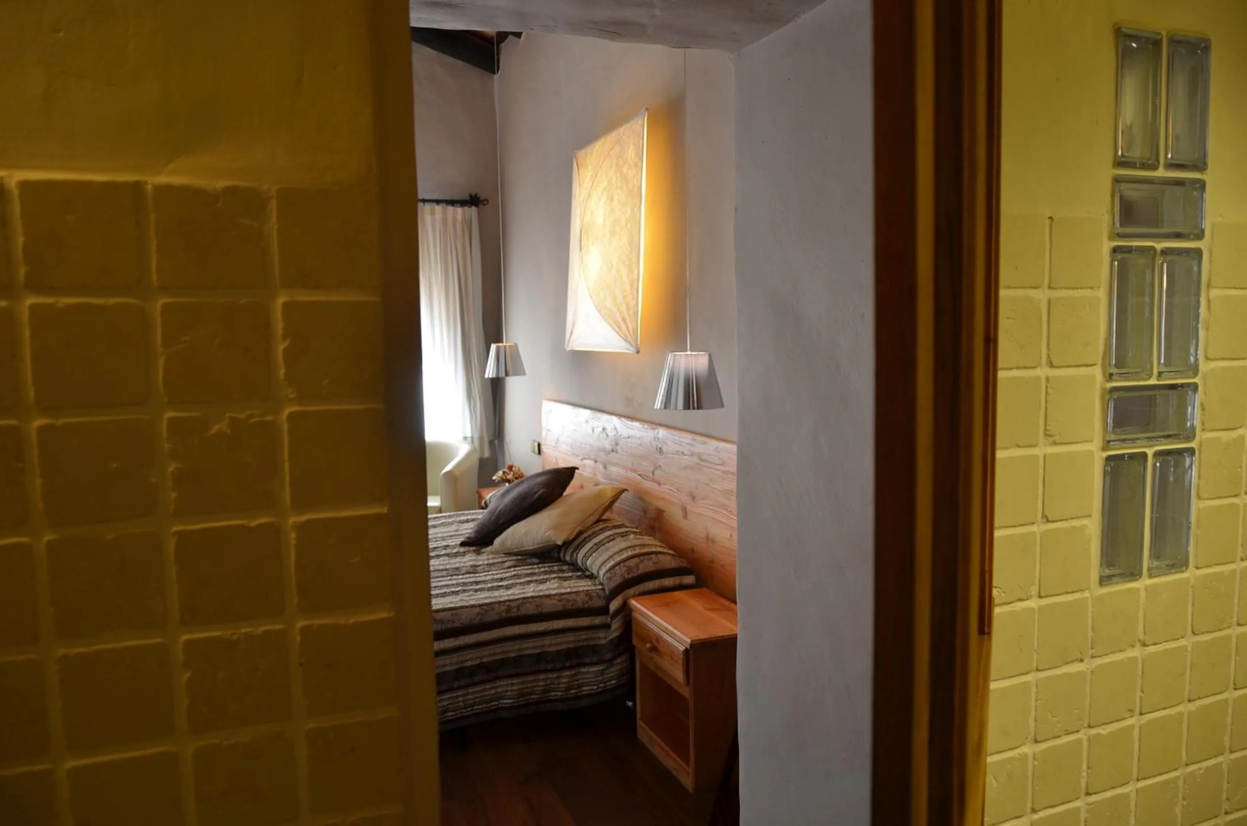 Decorative detail, Bed in Hotel Galena Mas Comangau