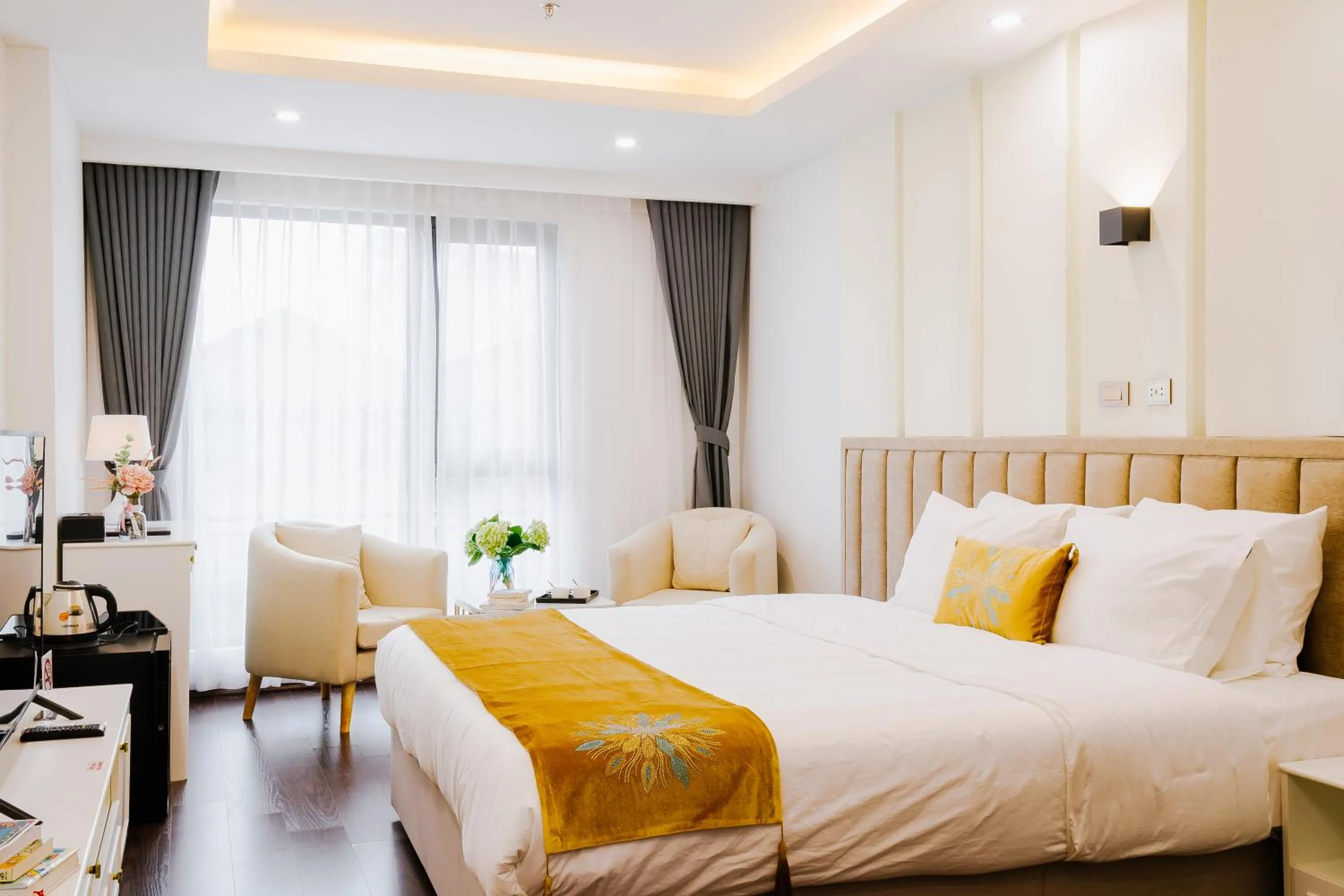 Bed in Royal Lotus Hotel