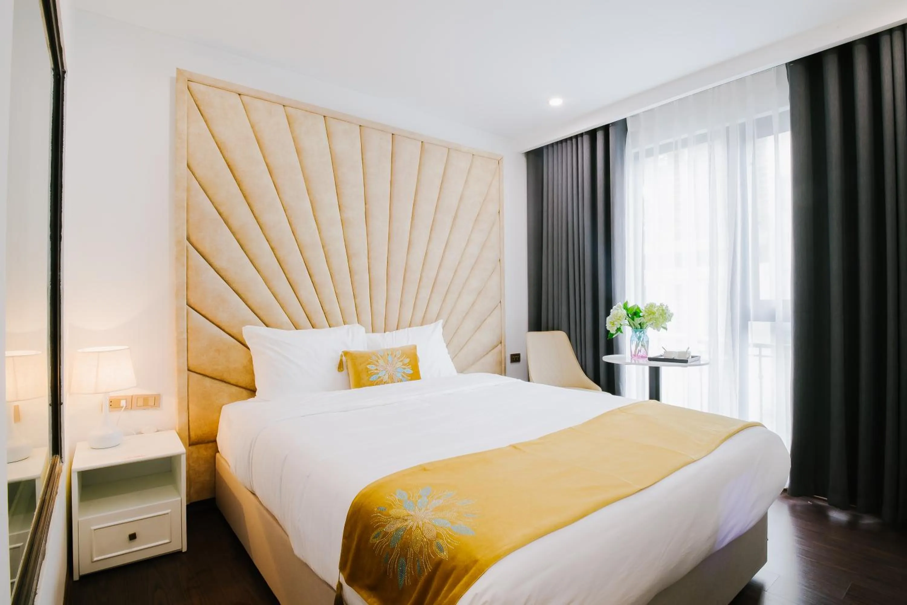 Bed in Royal Lotus Hotel