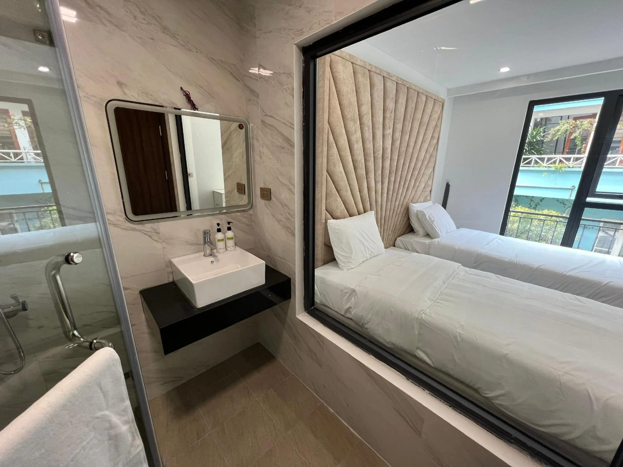 Bed in Royal Lotus Hotel