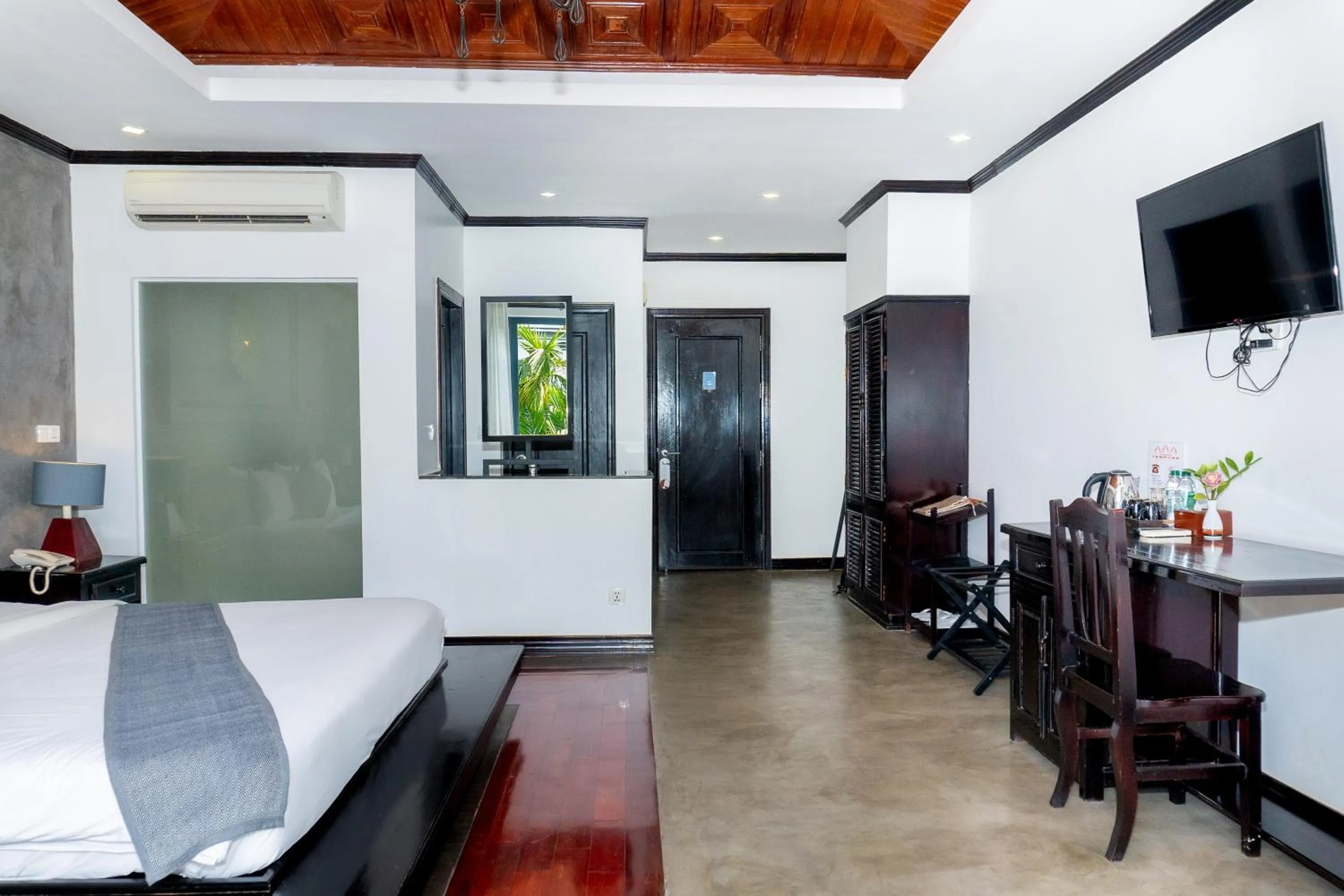 Seating area, Bed in Angkor Tempora Boutique