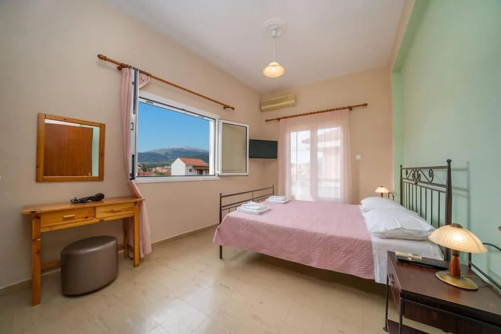Bed in Vasilakis Apartment