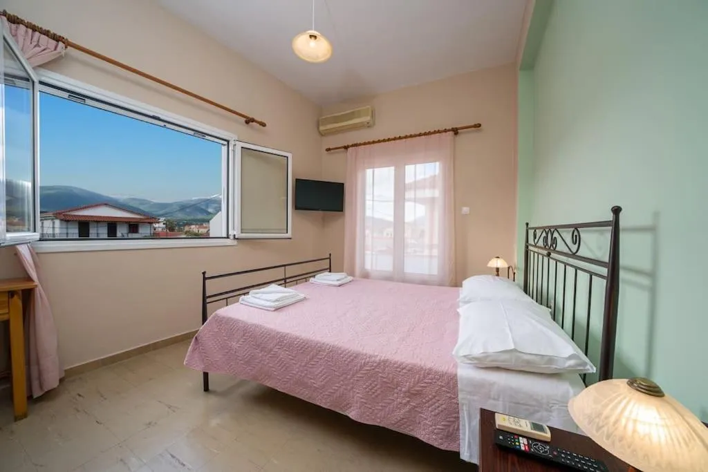 Bed in Vasilakis Apartment