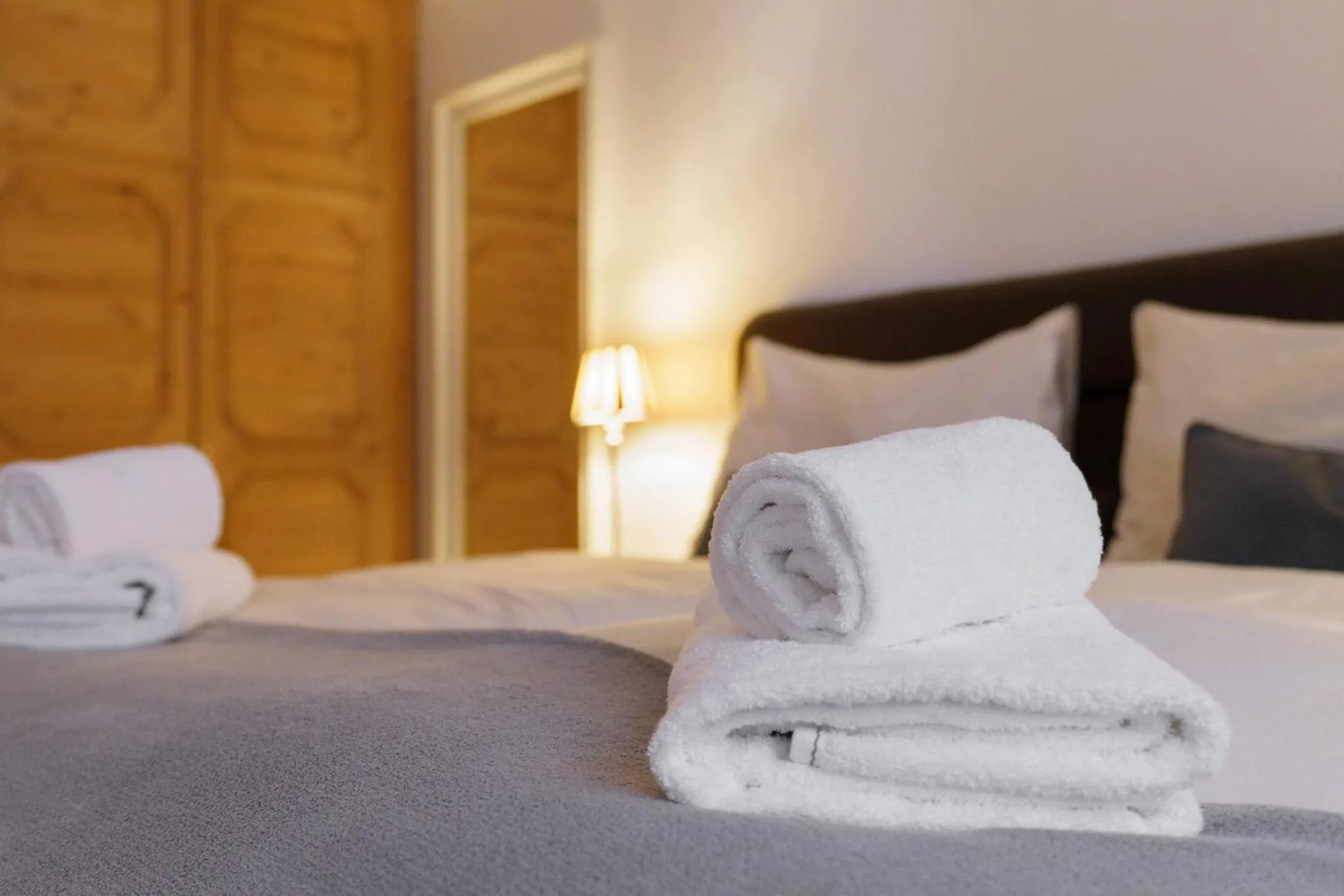 Bed in Kitz-Heart Apartments by Alpine Host Helpers