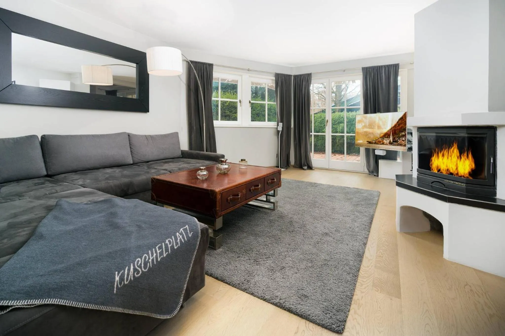 Communal lounge/ TV room in Kitz-Heart Apartments by Alpine Host Helpers