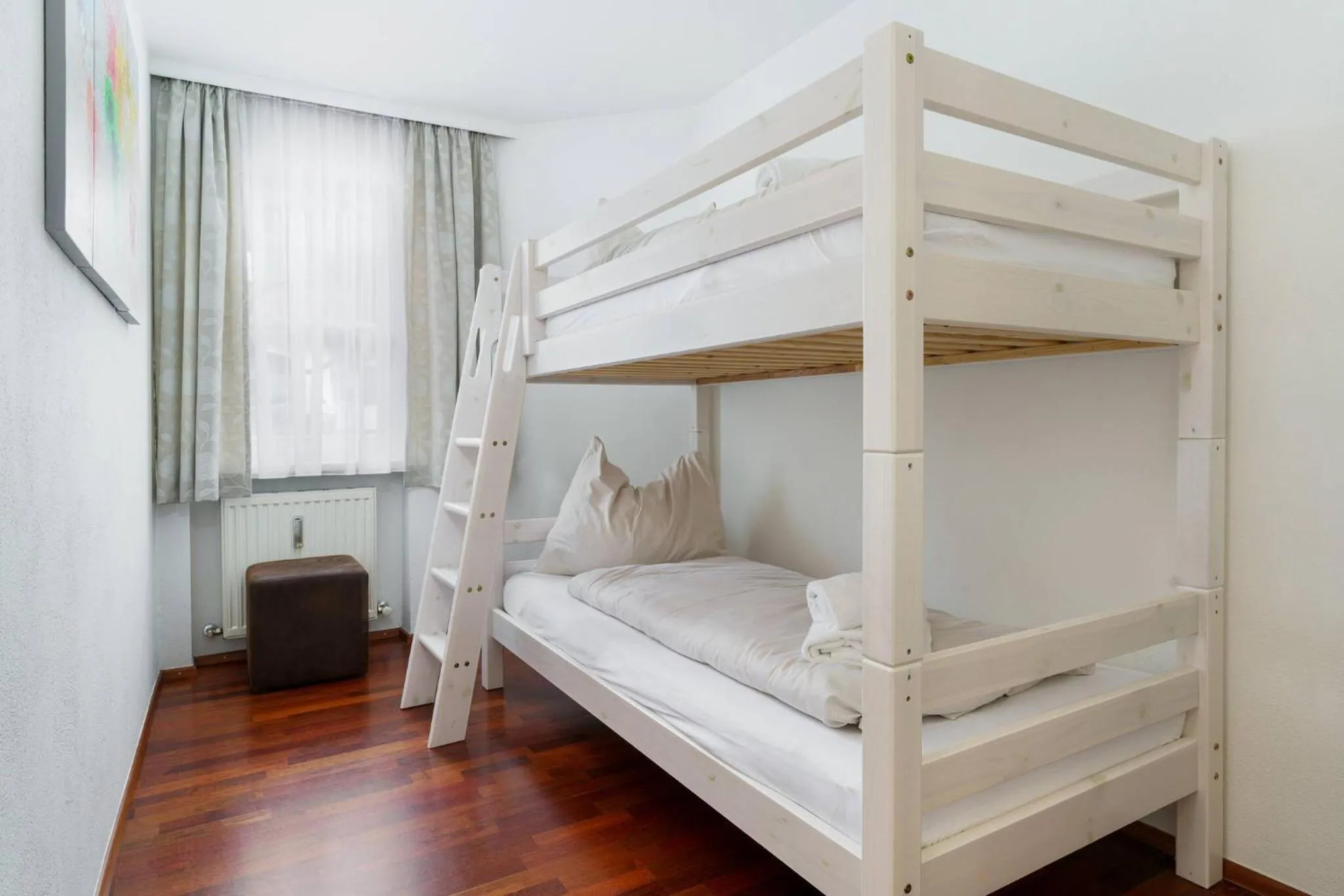 Bed in Kitz-Heart Apartments by Alpine Host Helpers
