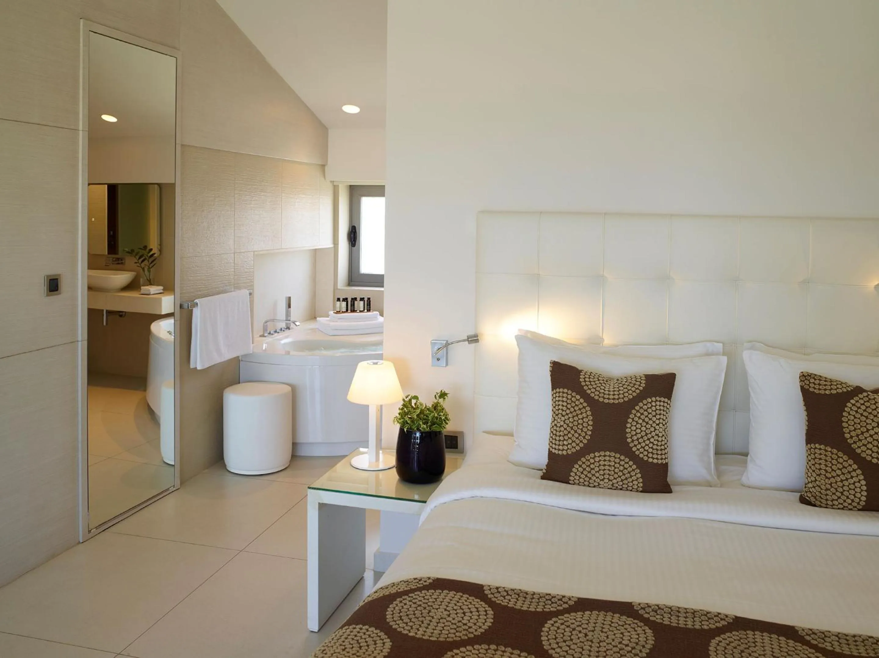 Bed in The Ixian Grand & All Suites - Adults Only Hotel
