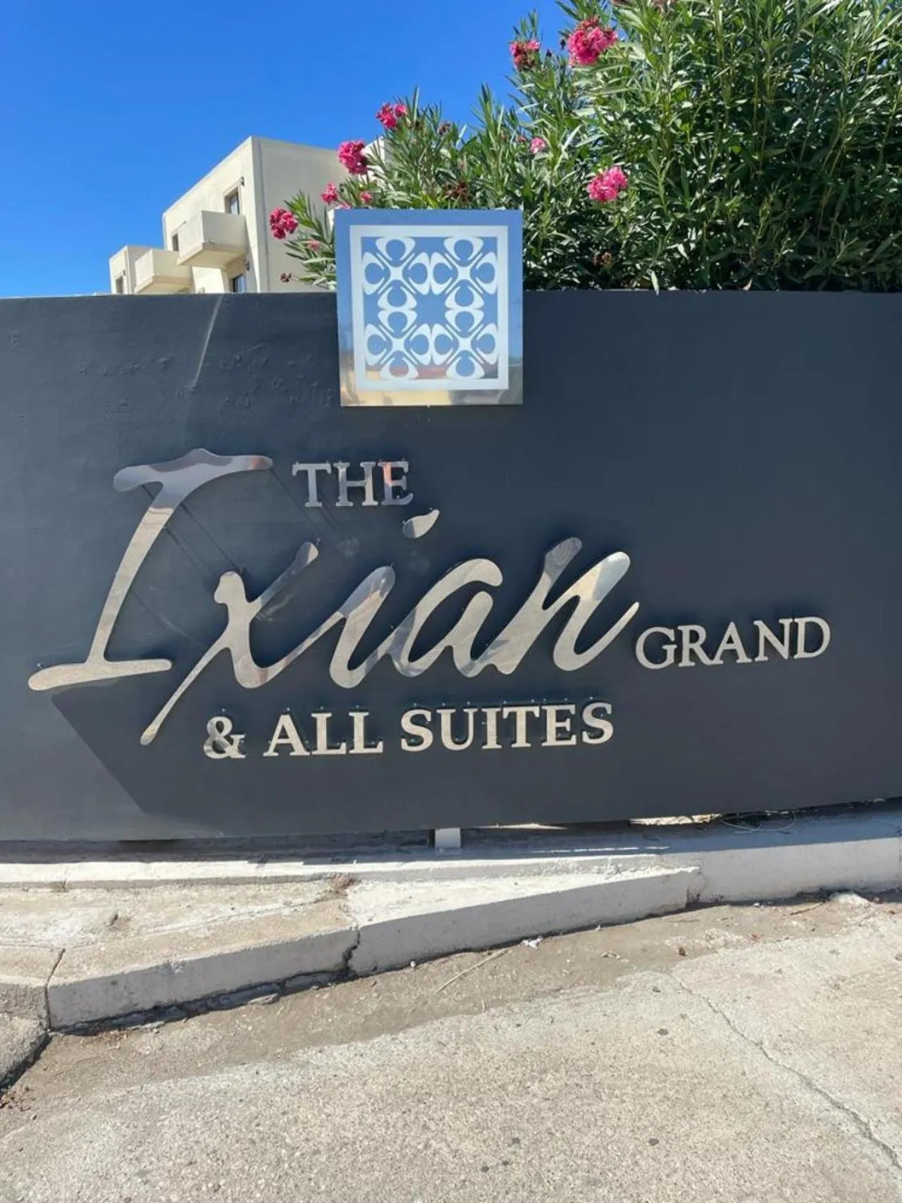 Property logo or sign in The Ixian Grand & All Suites - Adults Only Hotel