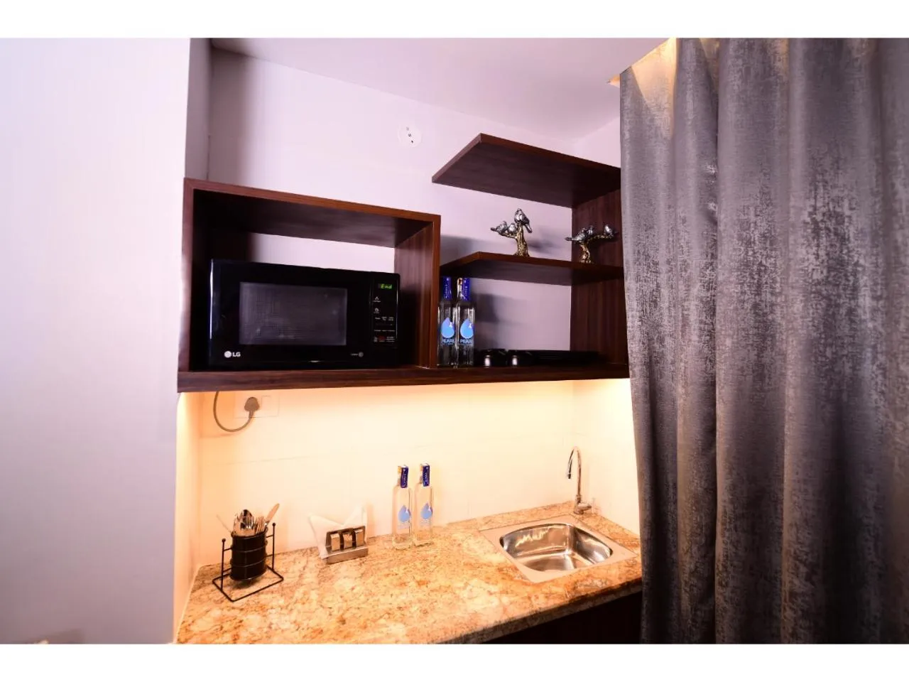 Kitchen or kitchenette in Belvedere Suites