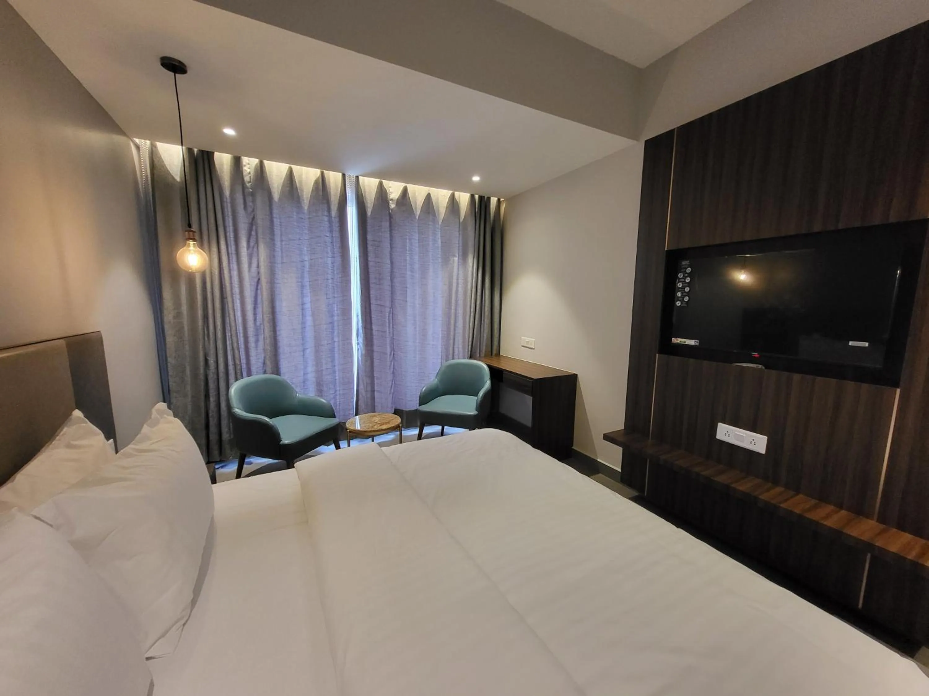 Bed in Belvedere Suites