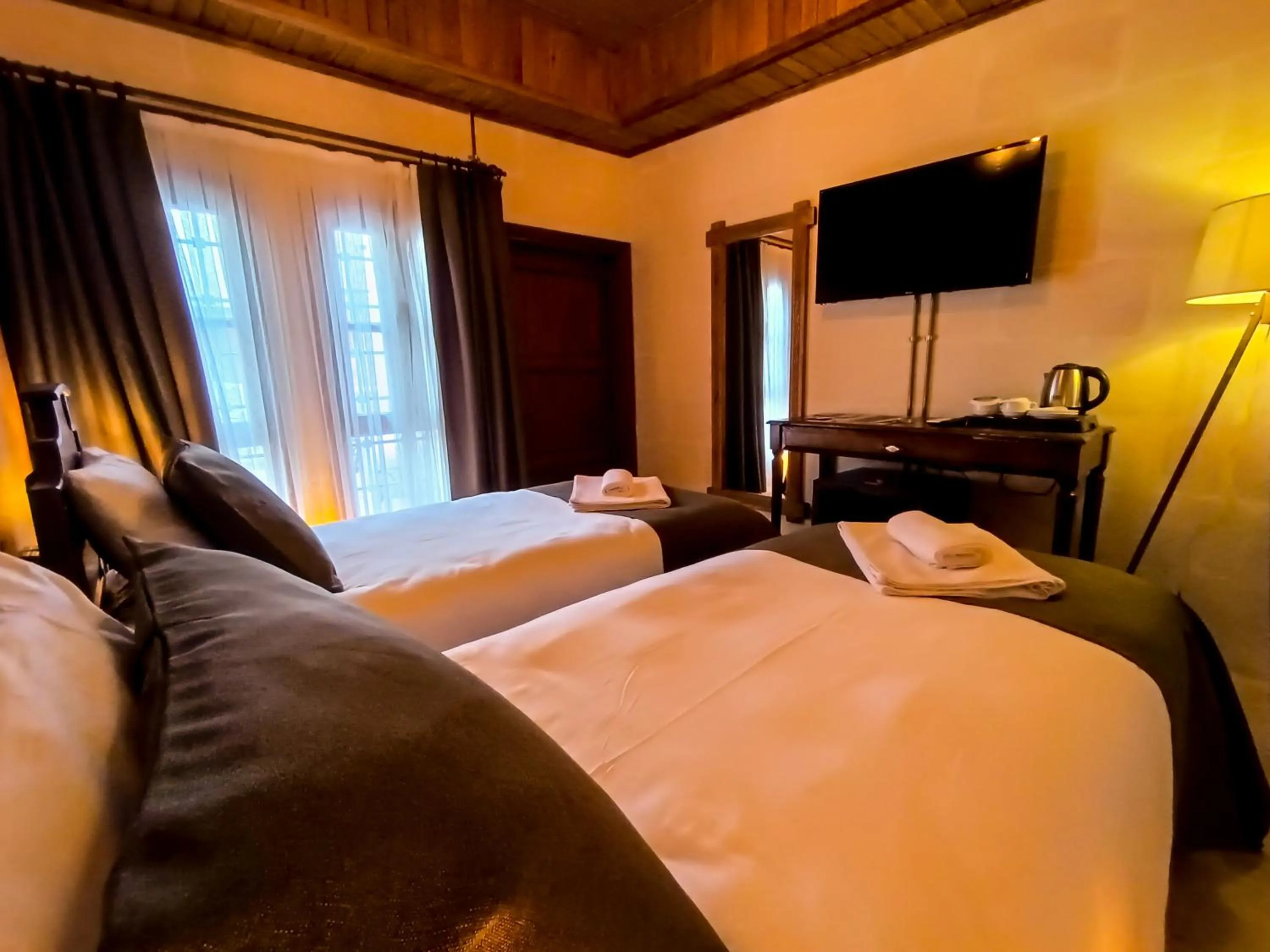 Bed in Reji Boutique Hotel