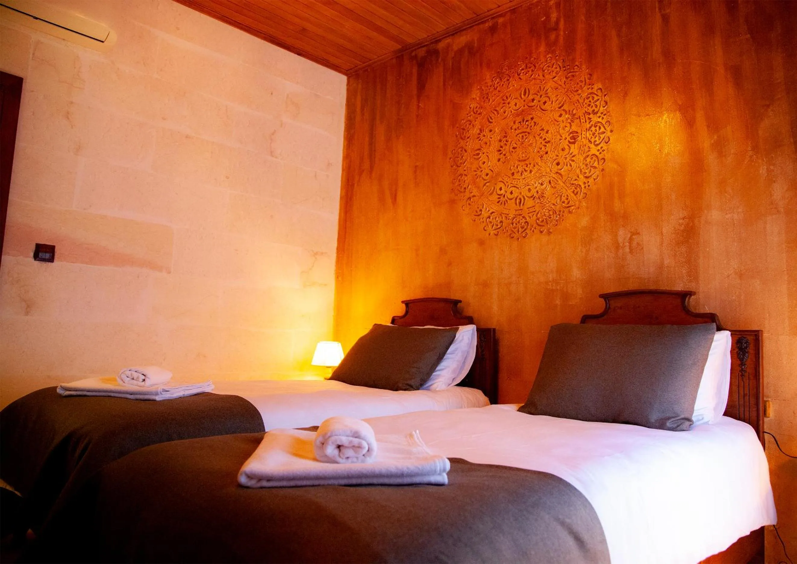 Bed in Reji Boutique Hotel