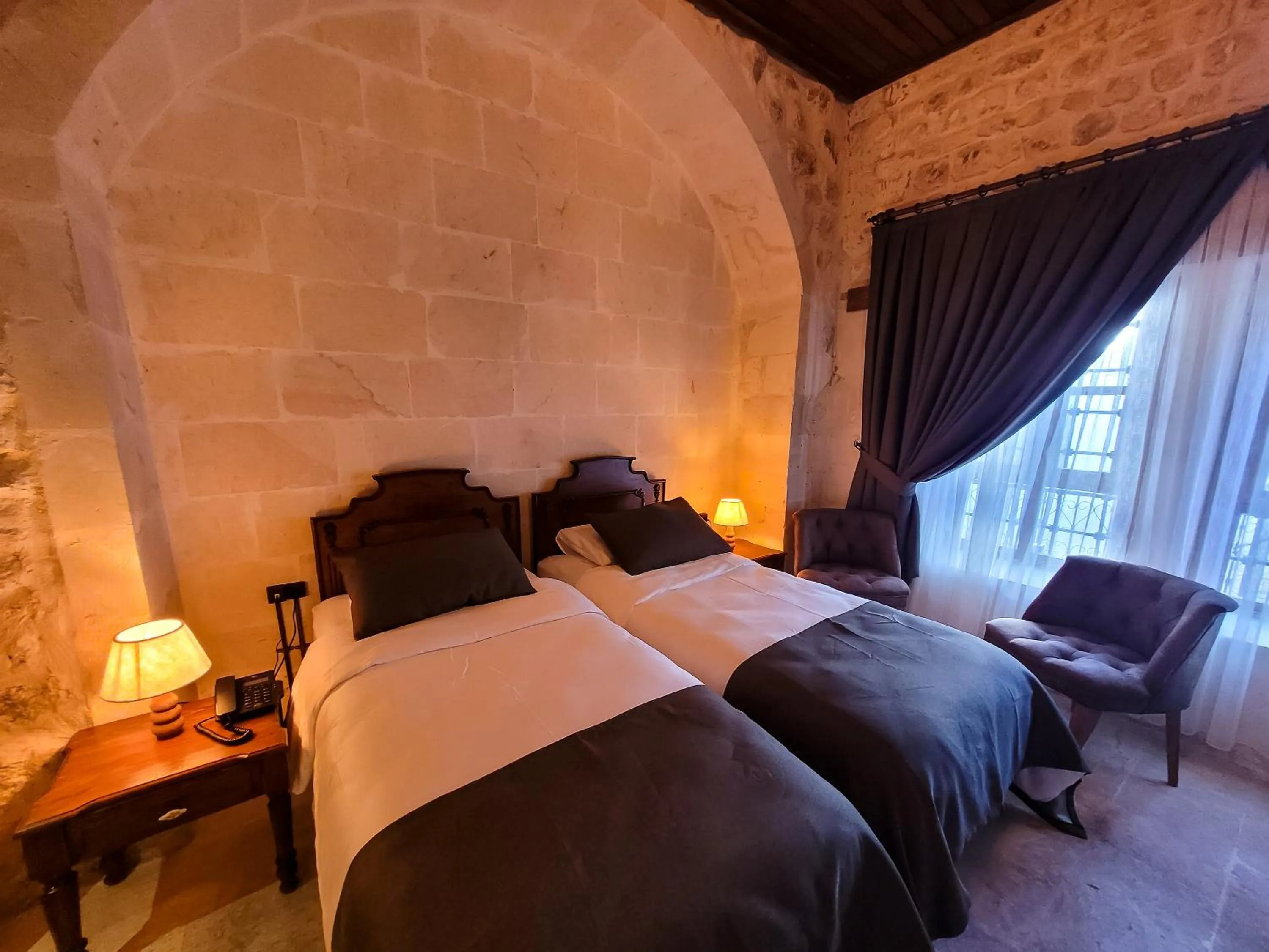 Bed in Reji Boutique Hotel