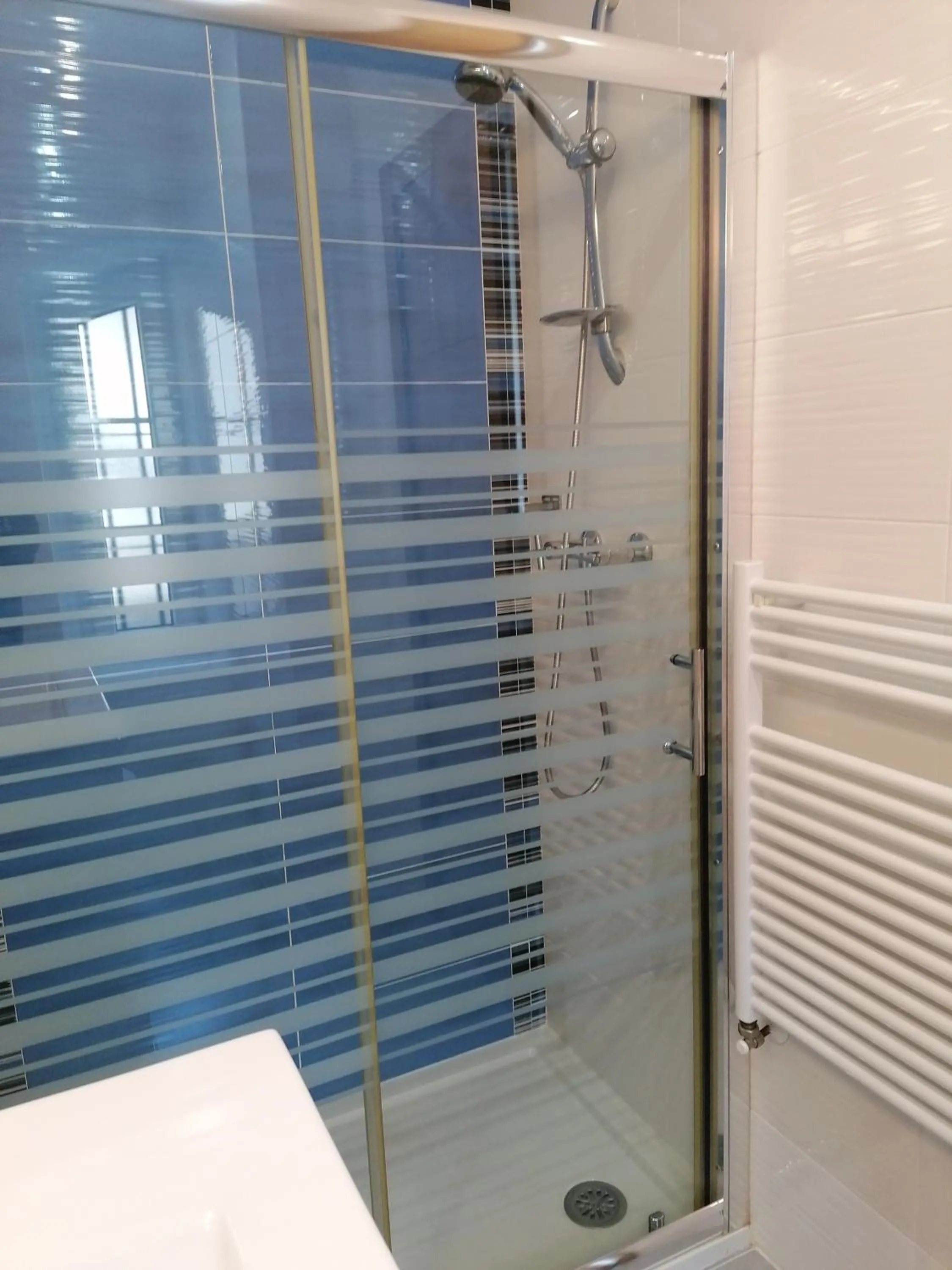 Shower in Alojamiento rural El Refugio