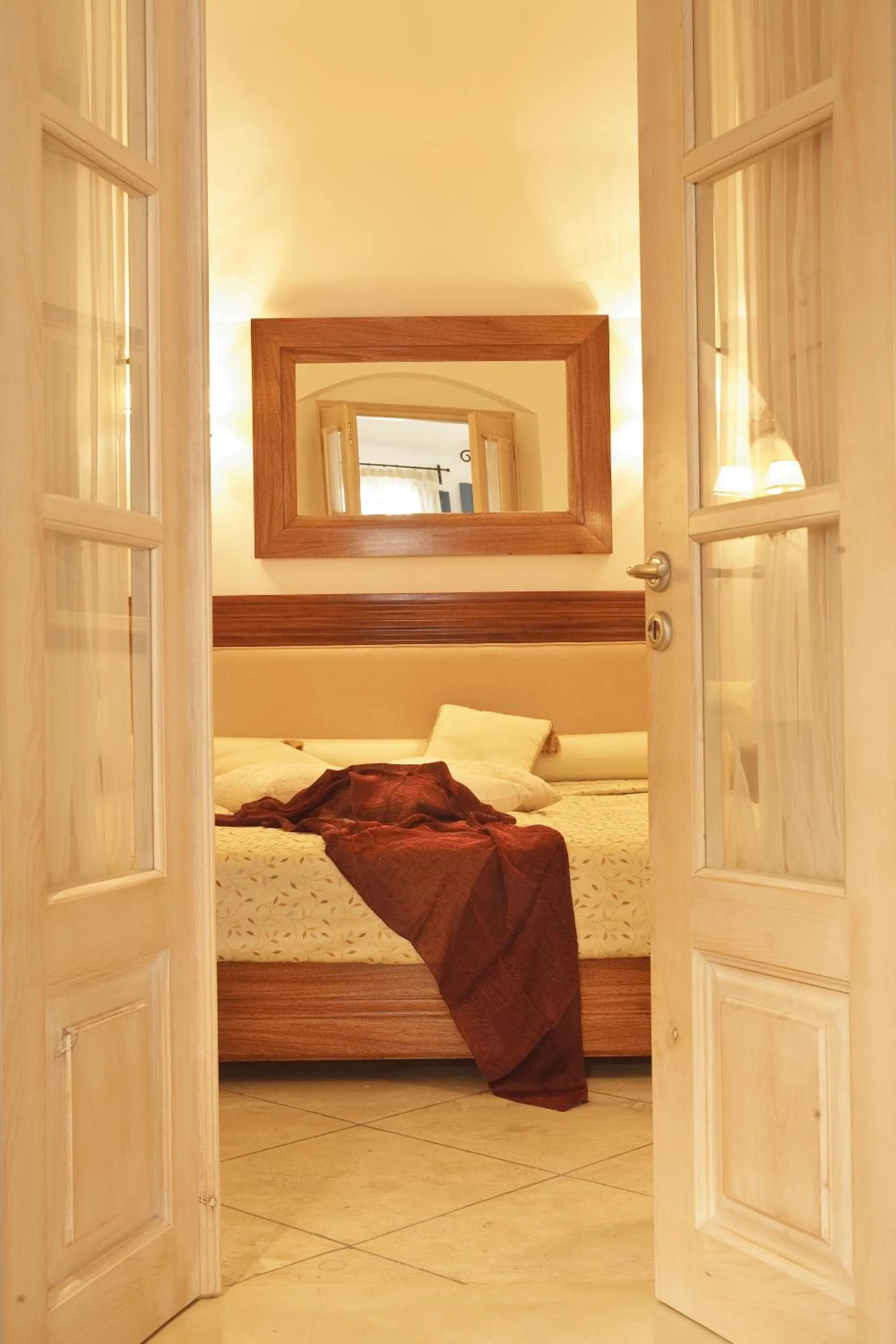 Bed in Tamarix Del Mar Suites