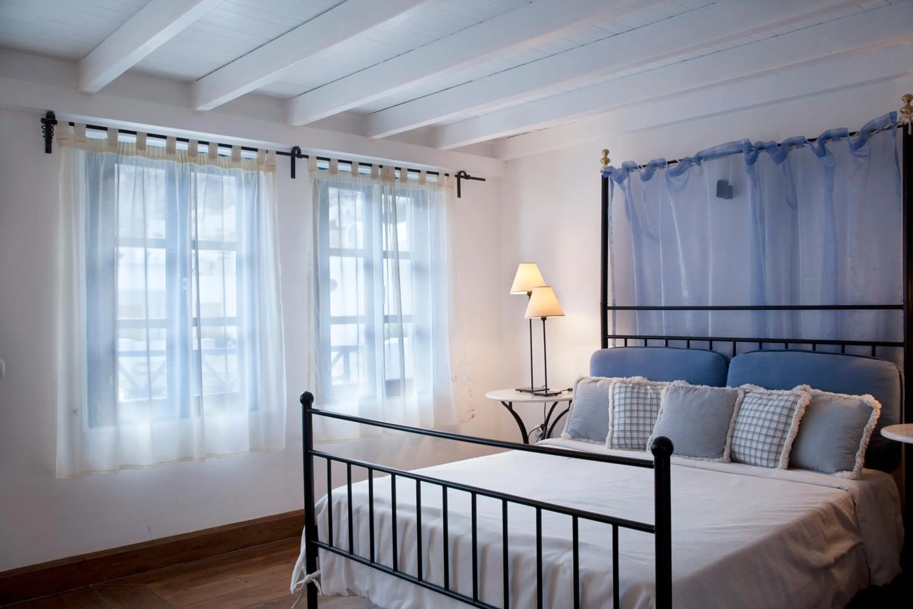 Bed in Tamarix Del Mar Suites