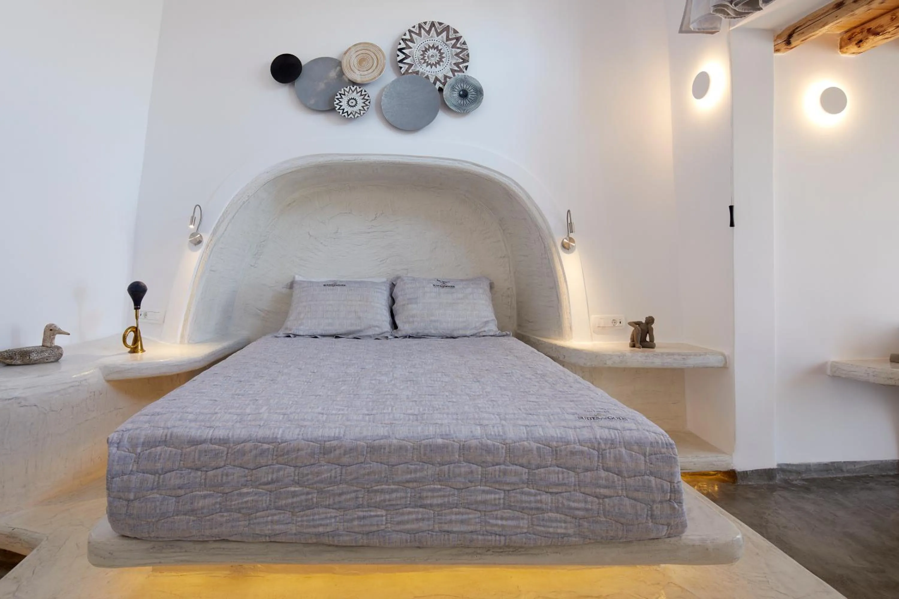 Bed in Suites of the Gods Cave Spa Hotel