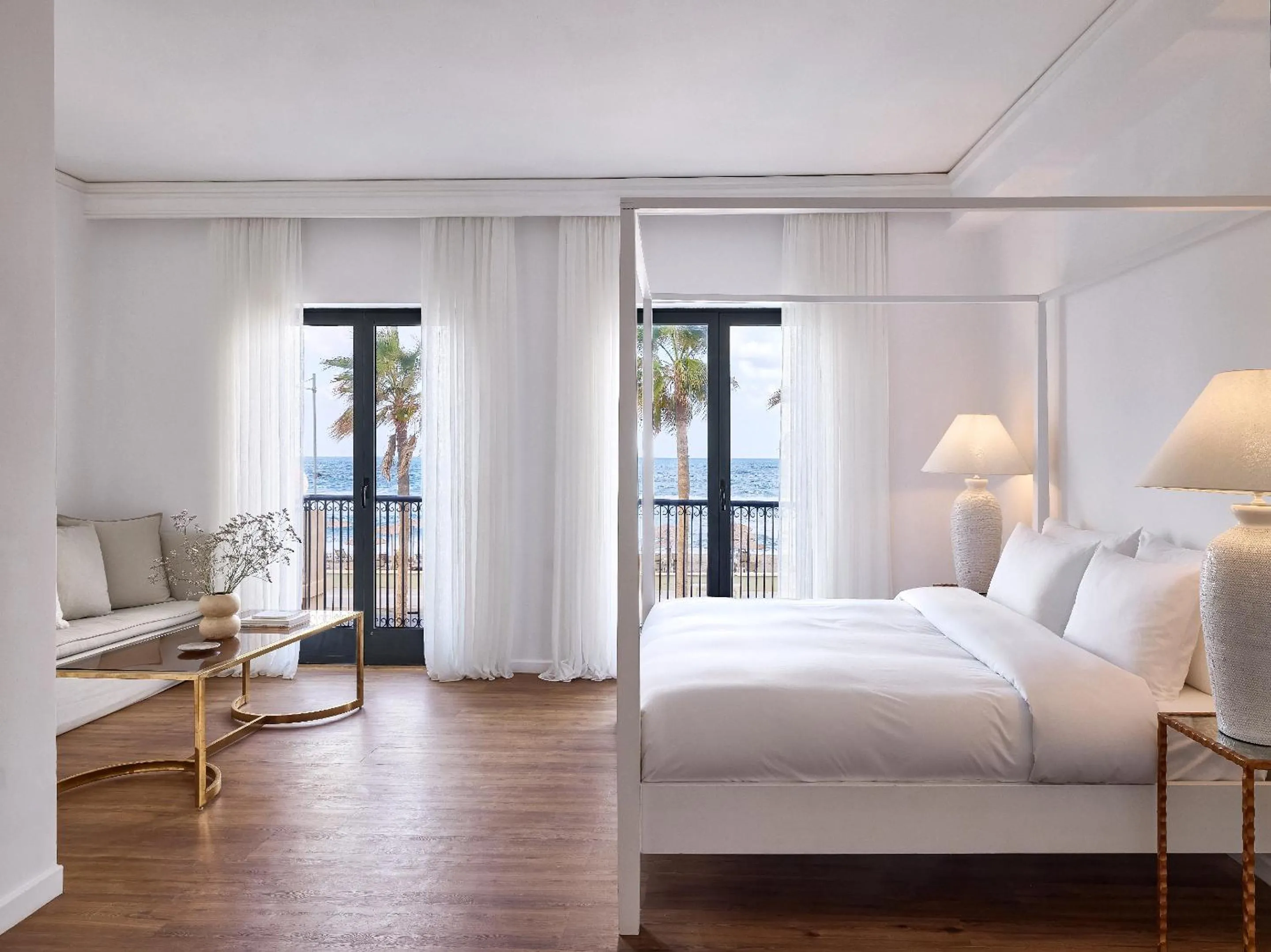 Bed in Grecotel Plaza Beach House