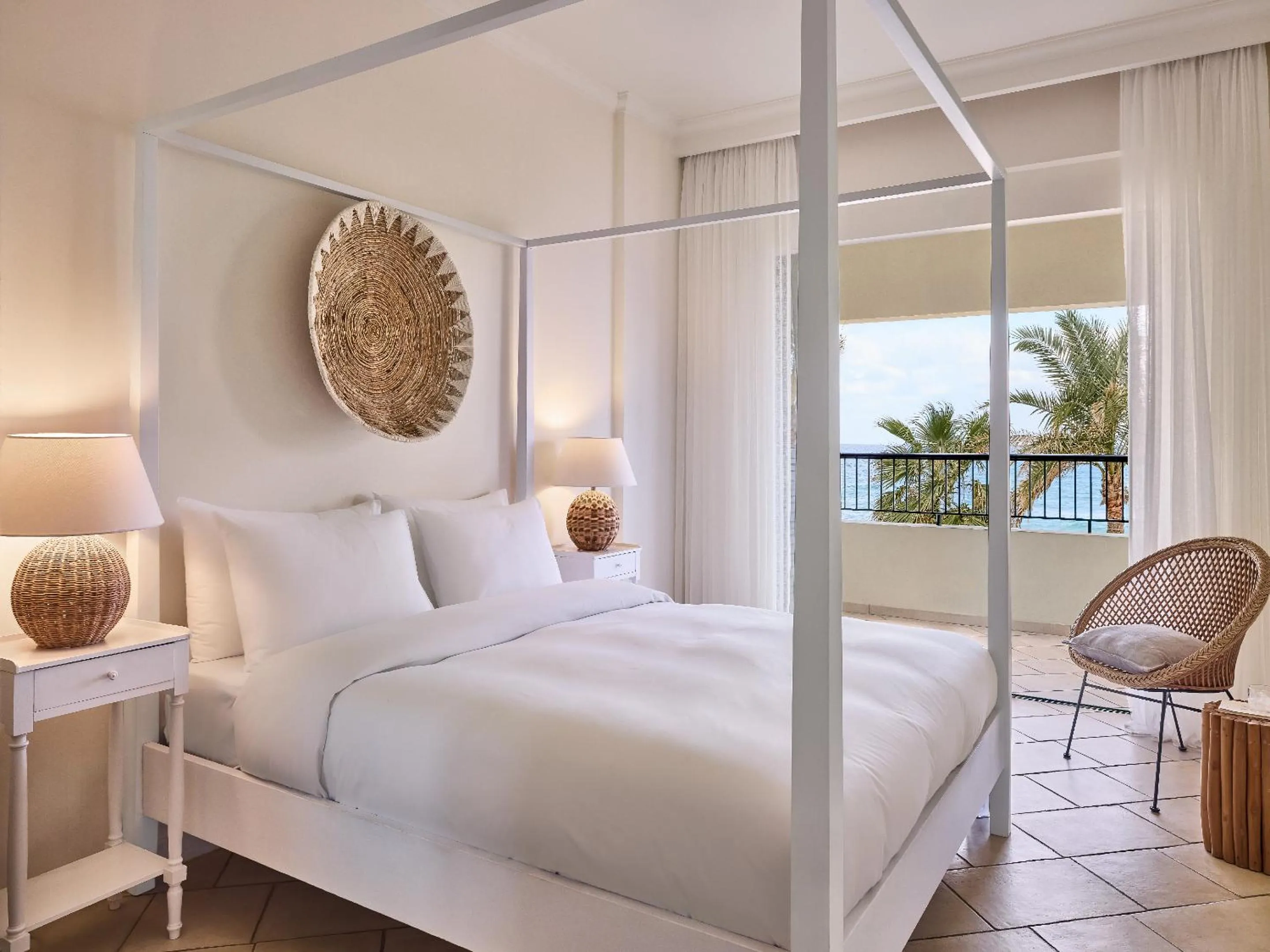 Bed in Grecotel Plaza Beach House