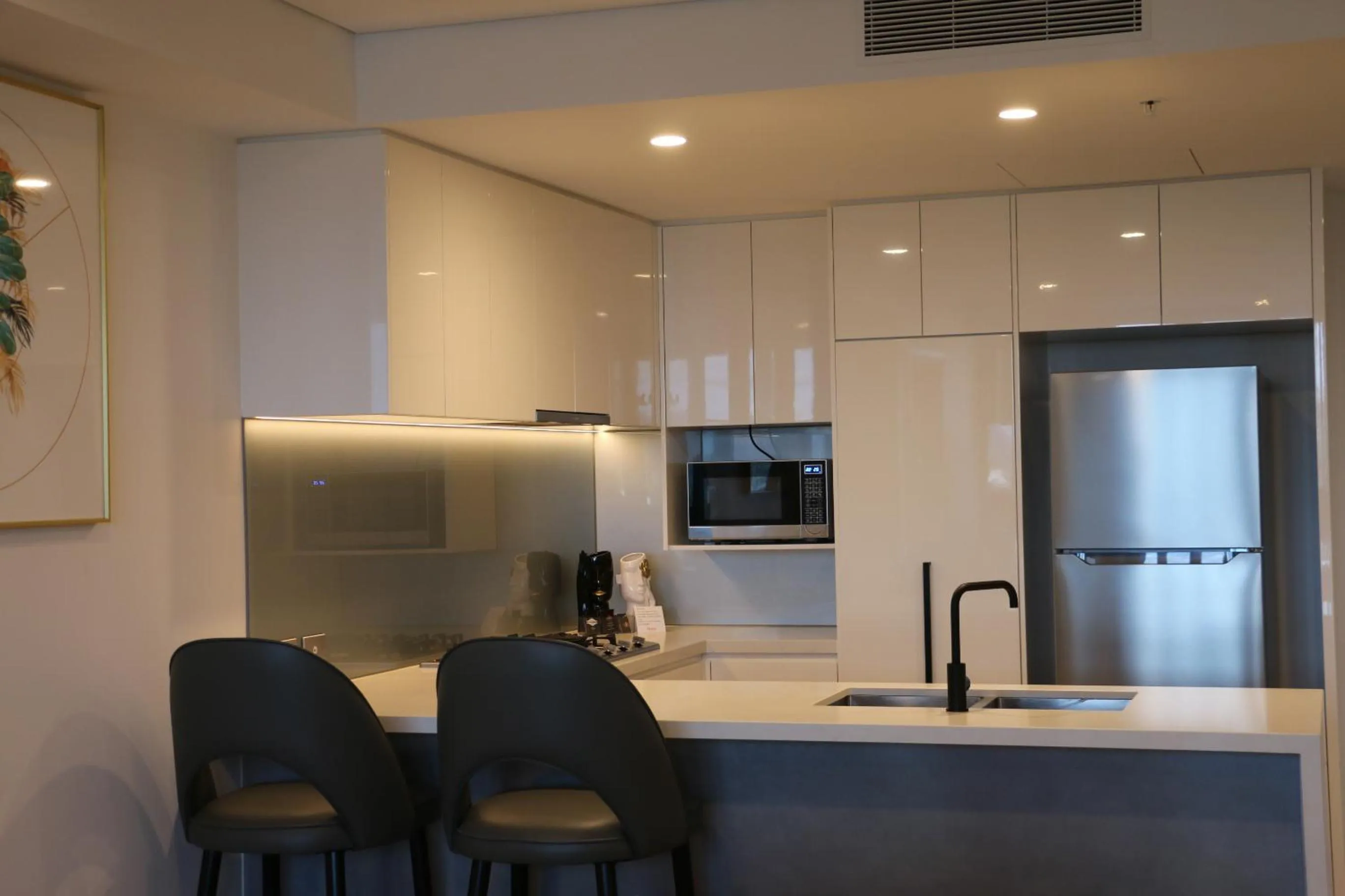 kitchen in Kooii Apartments