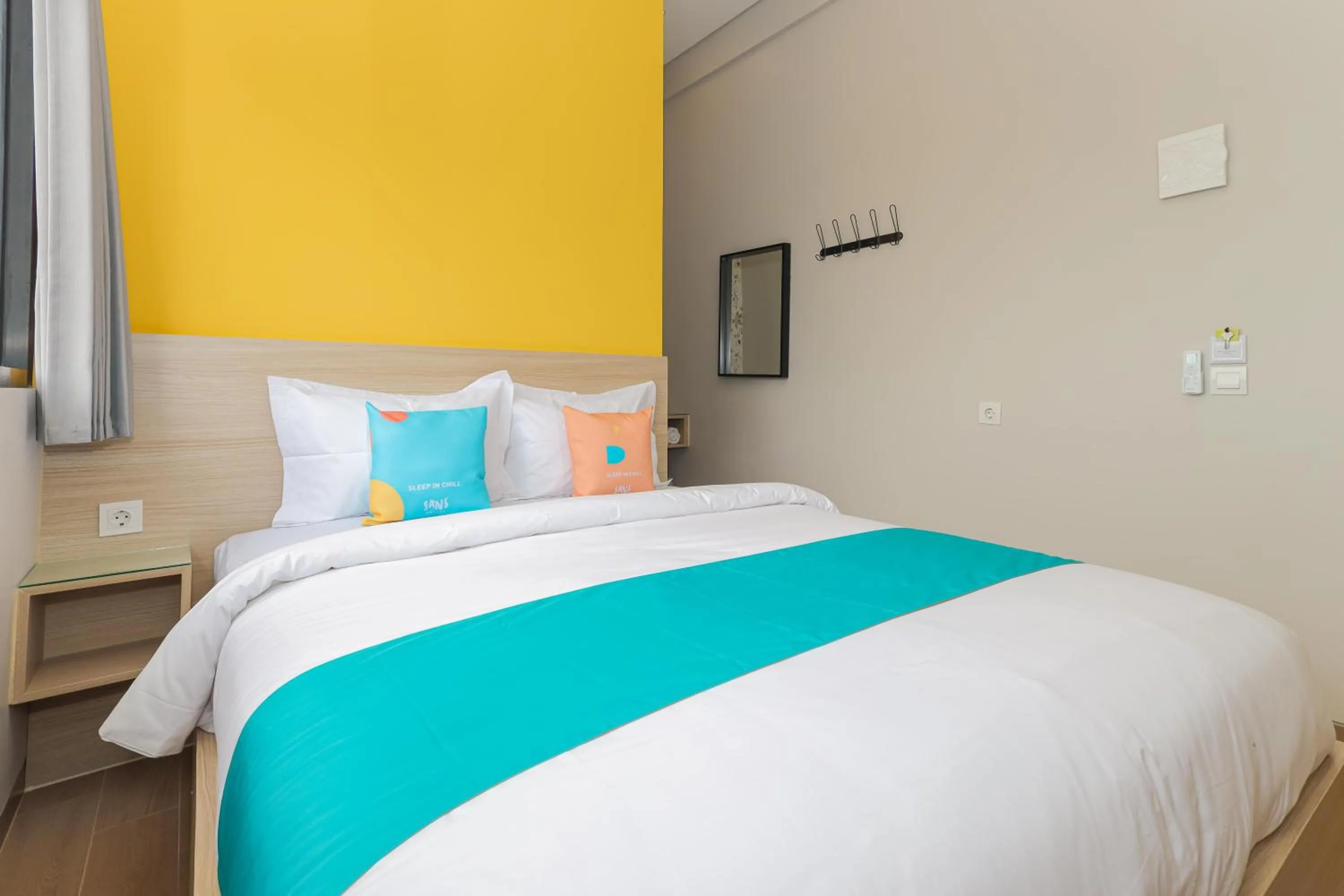 Bedroom, Bed in Sans Hotel Clover Ace Surabaya by RedDoorz