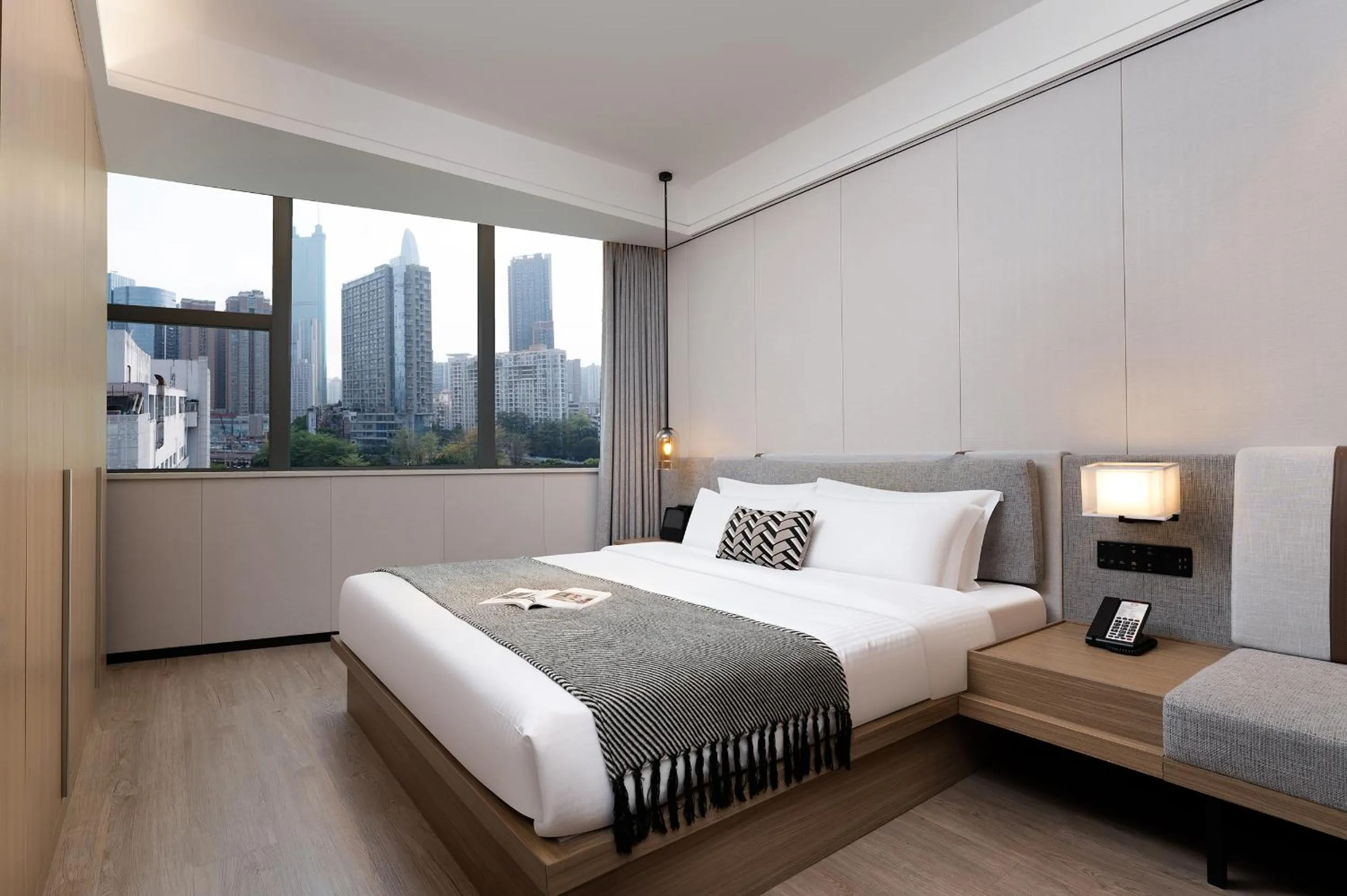 Bed in CM Serviced Apartment Shenzhen Dongmen